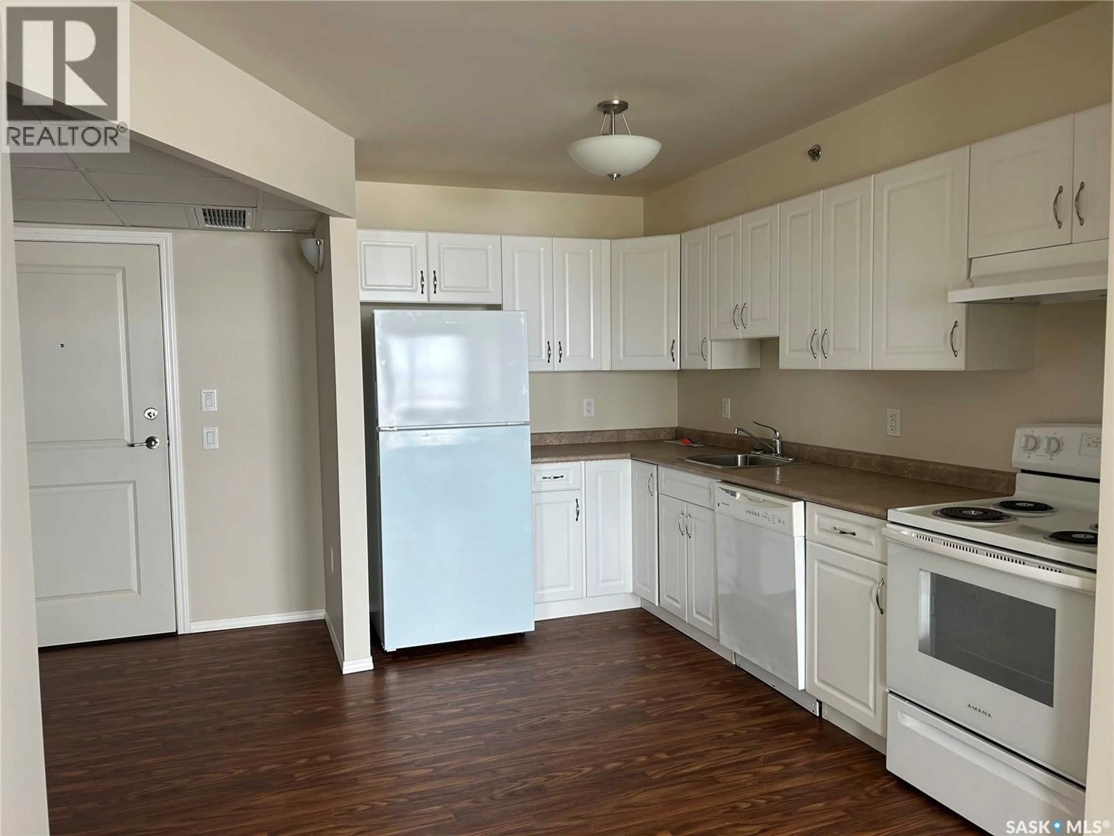 Standard kitchen, wood/laminate floor for 411 1011 106TH AVENUE, Tisdale Saskatchewan S0E1T0