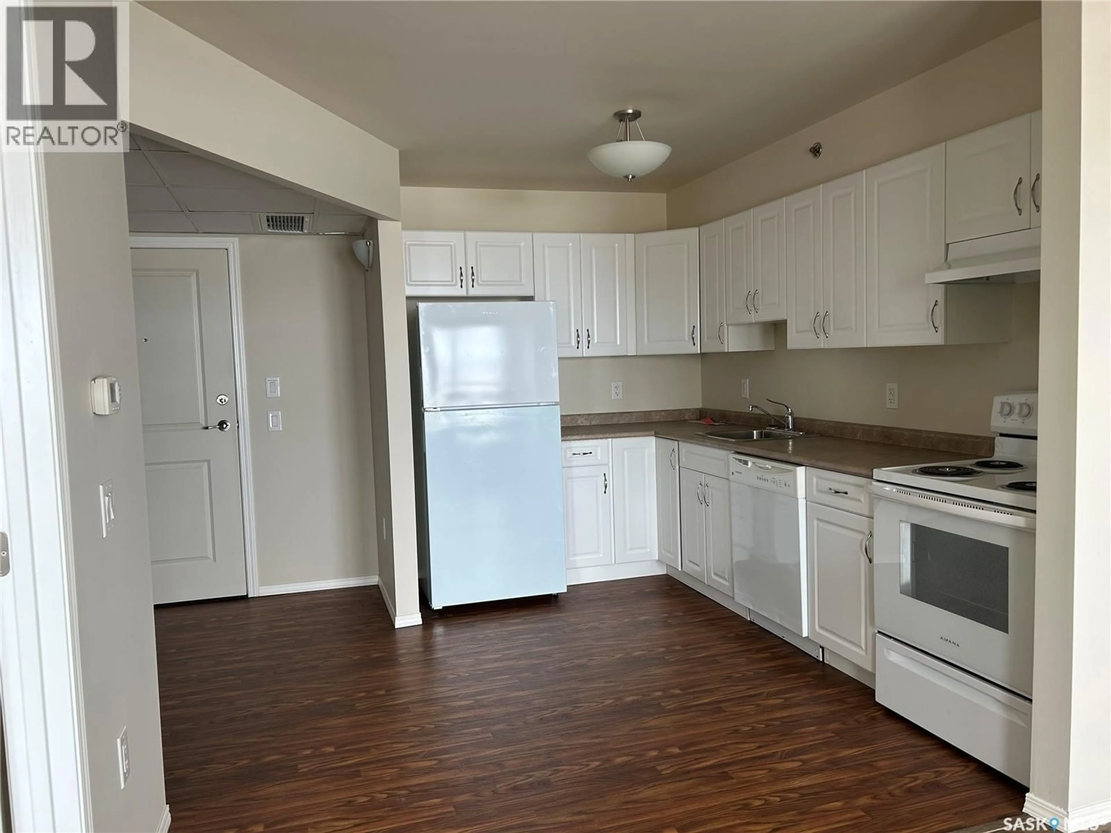 Standard kitchen, wood/laminate floor for 411 1011 106TH AVENUE, Tisdale Saskatchewan S0E1T0