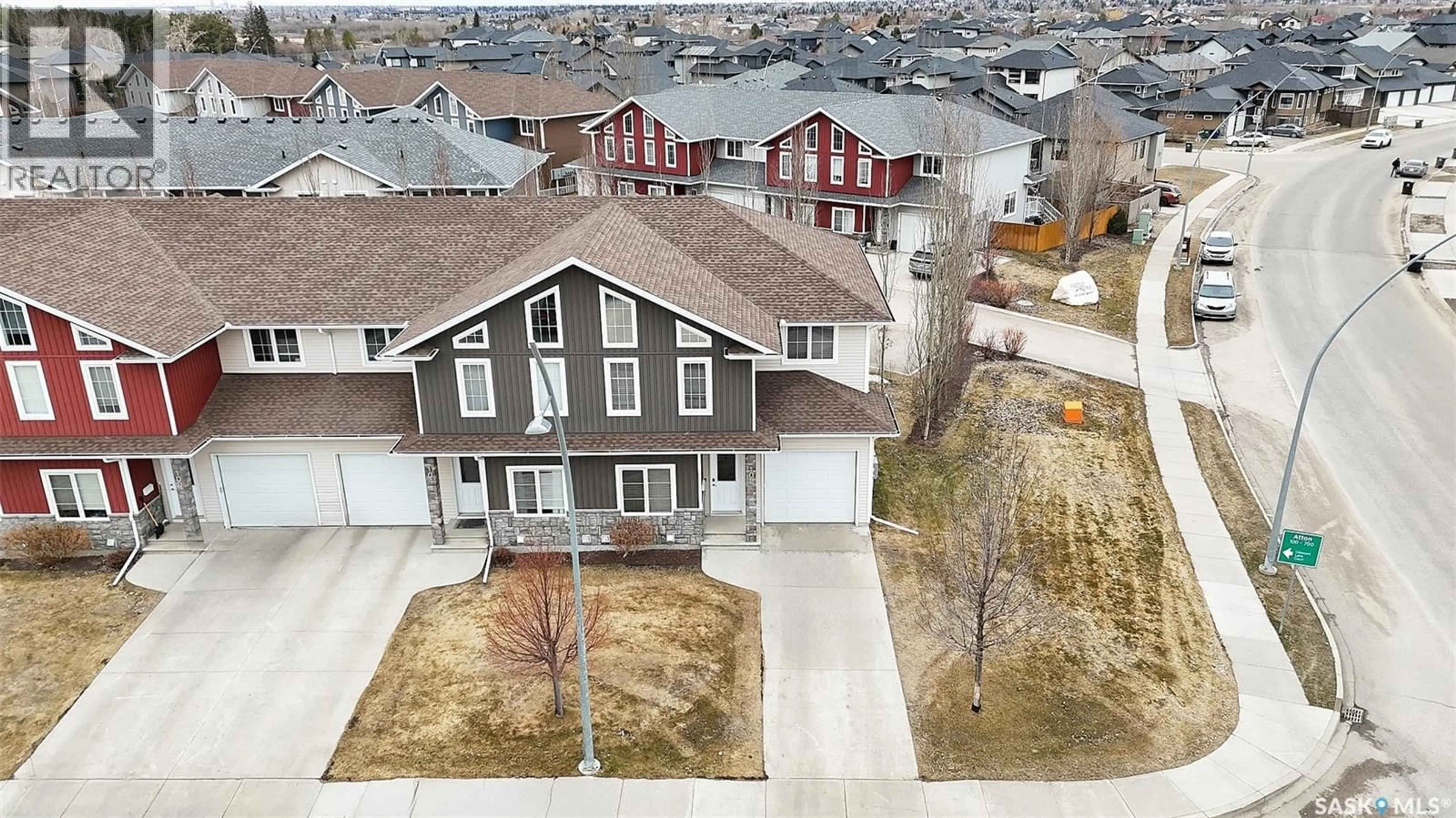 A pic from outside/outdoor area/front of a property/back of a property/a pic from drone, street for 102 ATTON CRESCENT, Saskatoon Saskatchewan S7W0N9