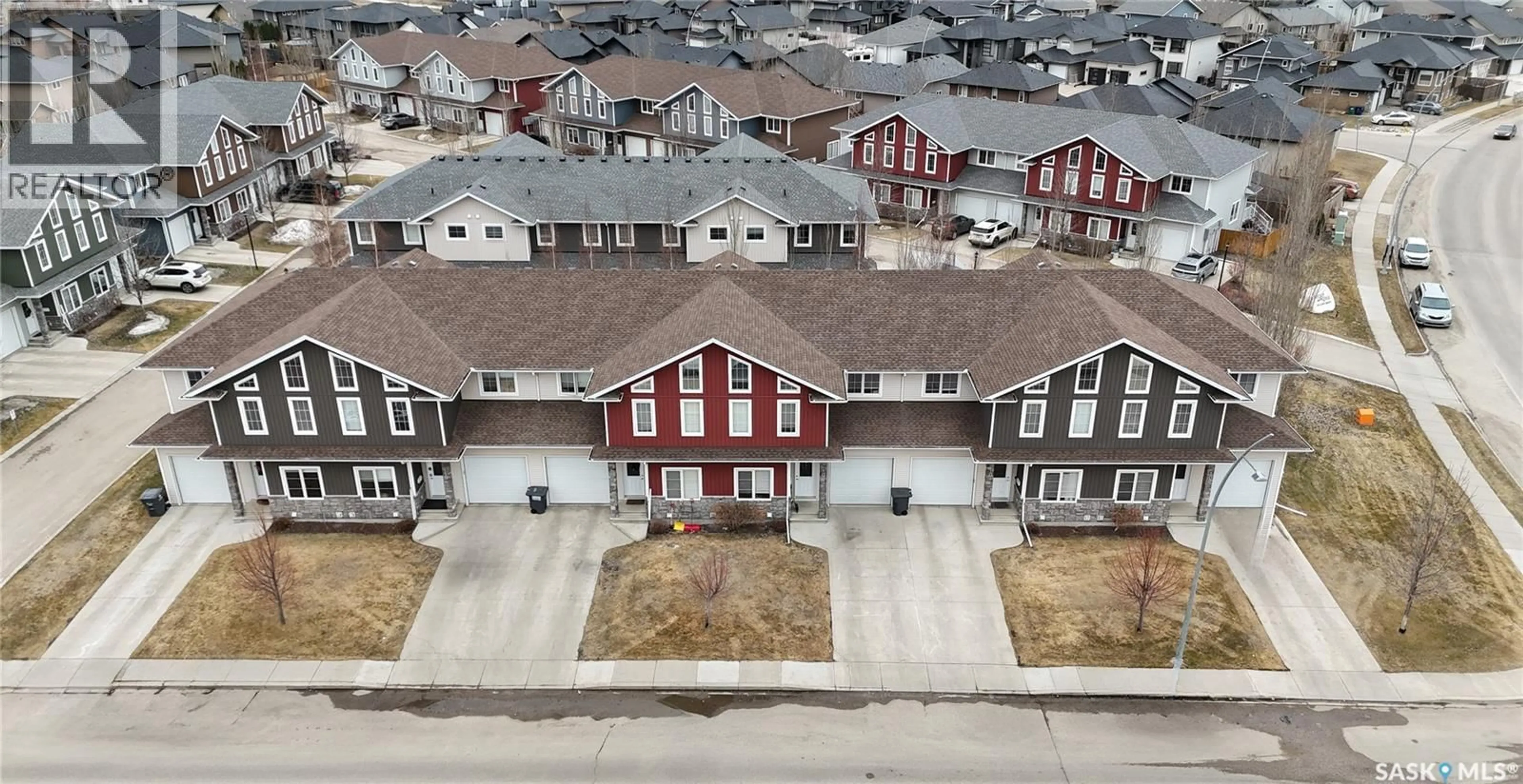 A pic from outside/outdoor area/front of a property/back of a property/a pic from drone, street for 102 ATTON CRESCENT, Saskatoon Saskatchewan S7W0N9