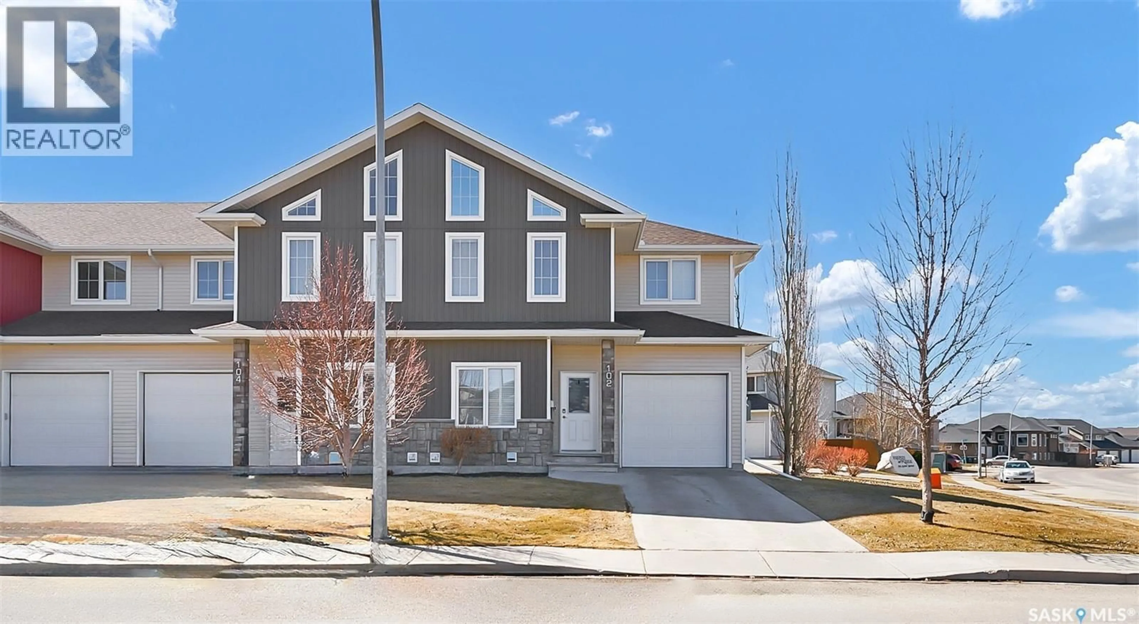 Home with brick exterior material, street for 102 ATTON CRESCENT, Saskatoon Saskatchewan S7W0N9