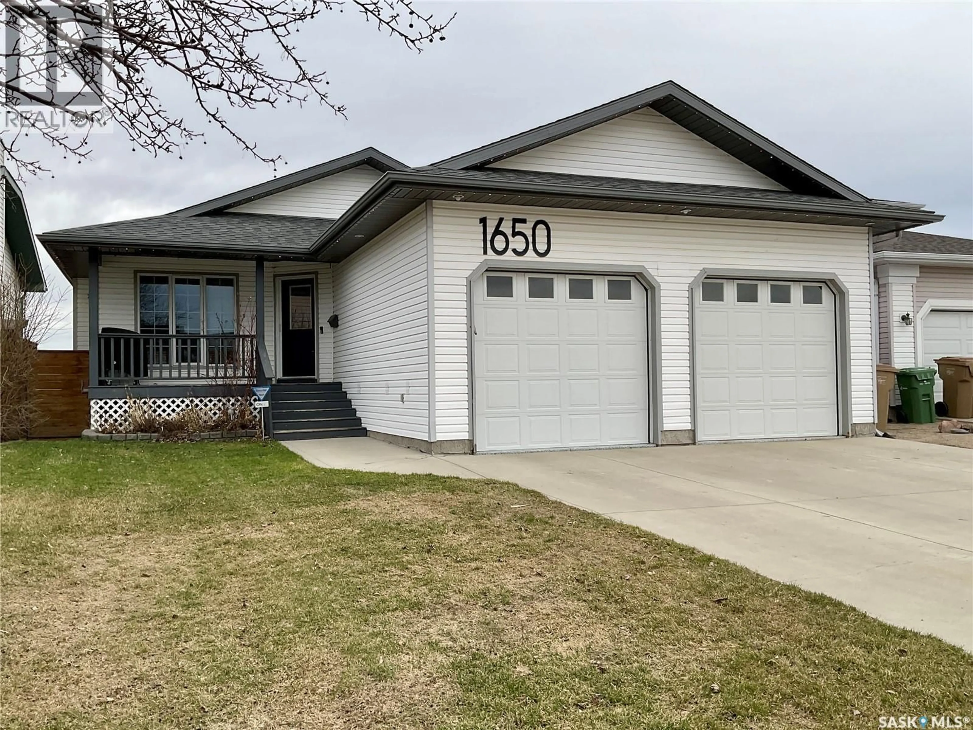 Home with vinyl exterior material, street for 1650 ROUSSEAU CRESCENT, Regina Saskatchewan S4X4L9