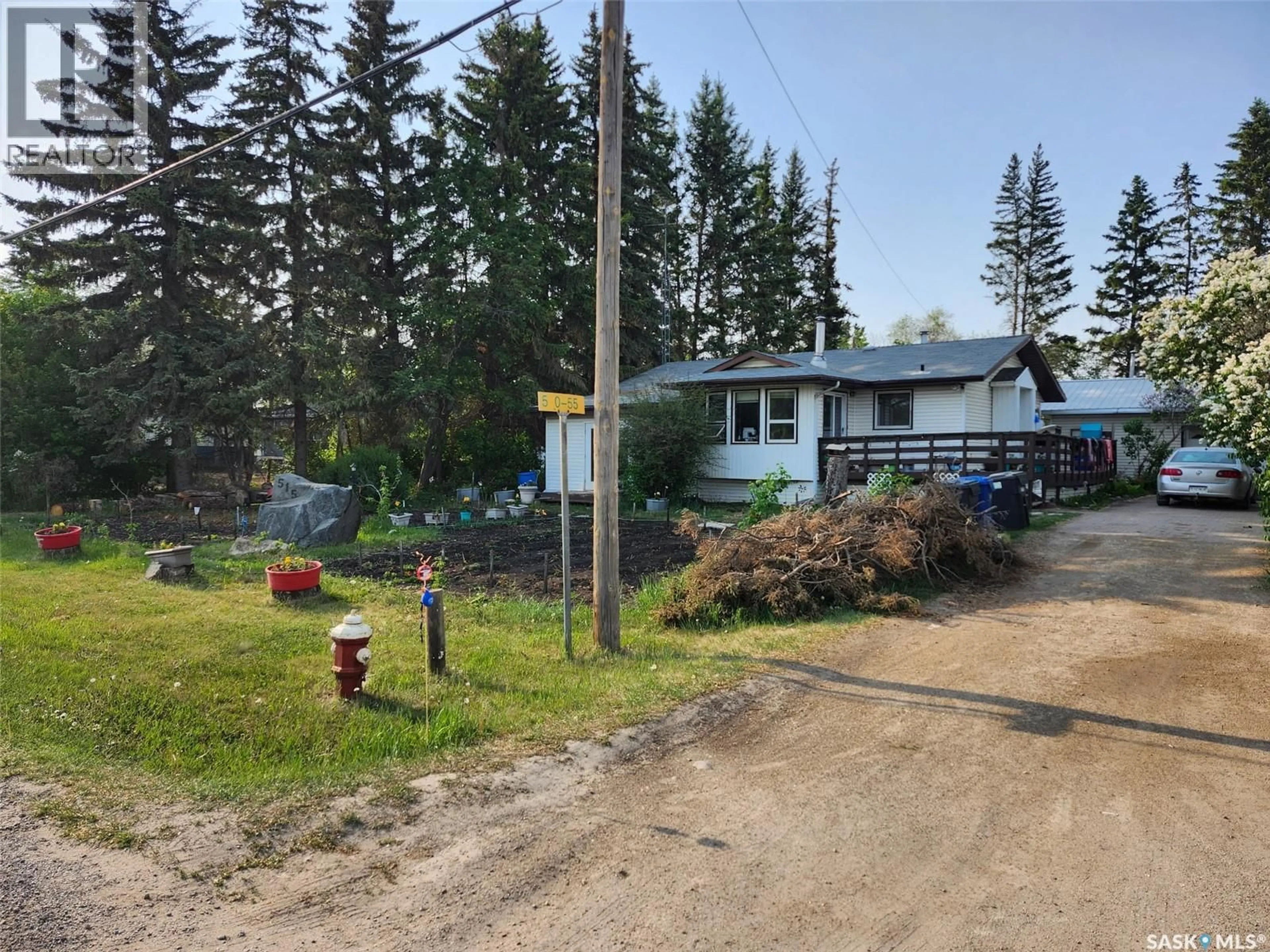 A pic from outside/outdoor area/front of a property/back of a property/a pic from drone, unknown for 515 DUNCAN DRIVE, Leask Saskatchewan S0J1M0