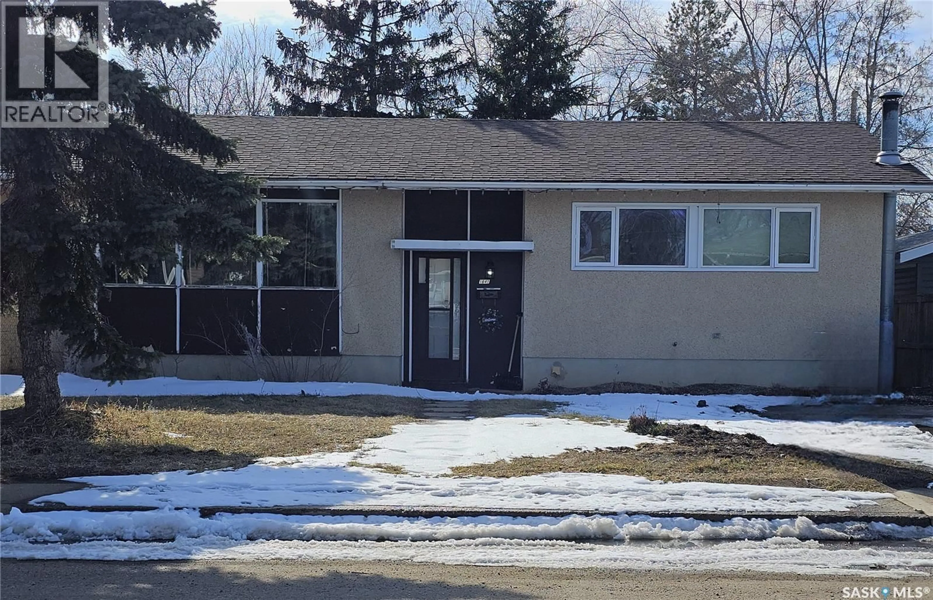 Home with vinyl exterior material, street for 1641 103RD STREET, North Battleford Saskatchewan S9A1L6