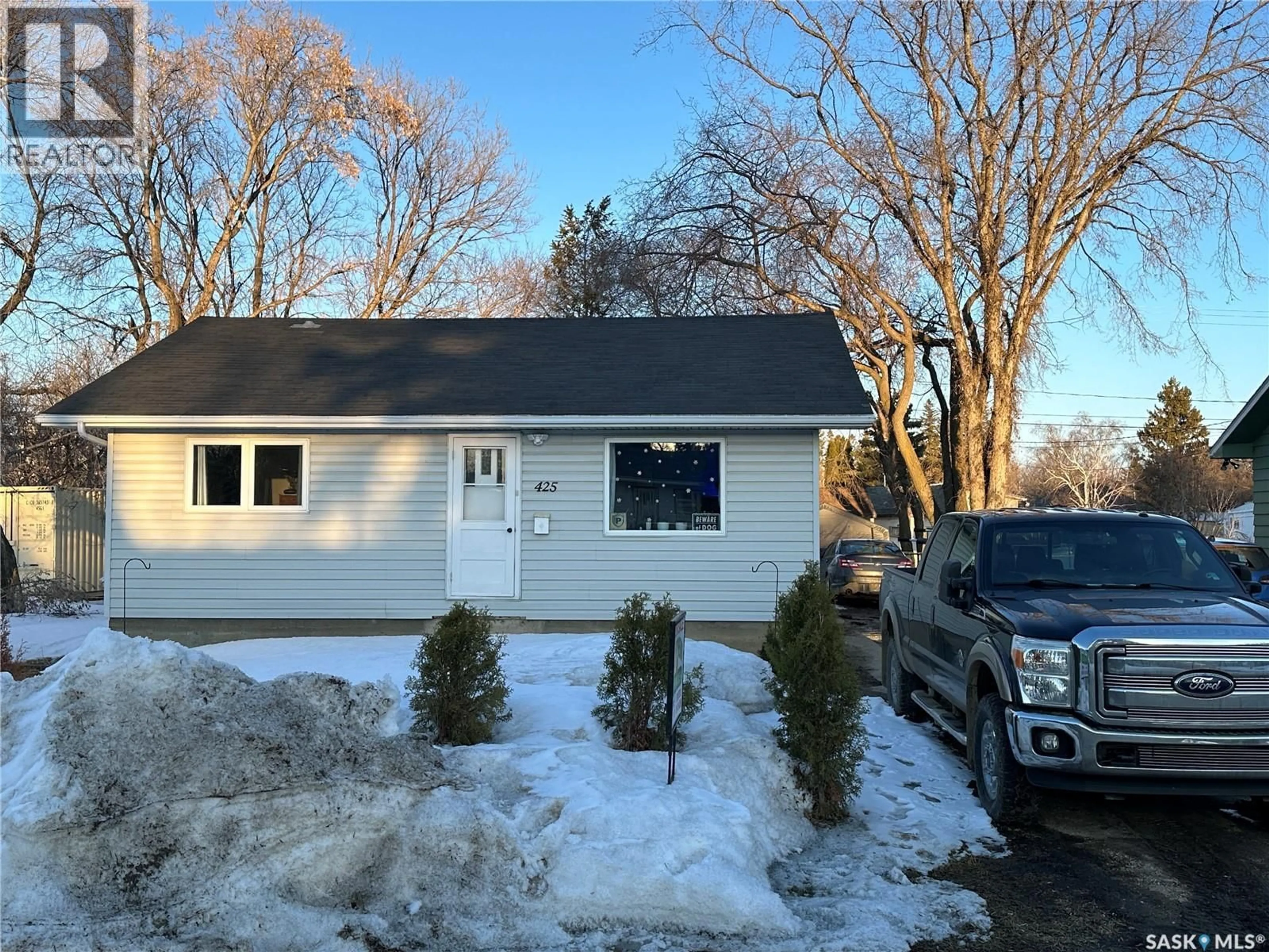 Home with vinyl exterior material, street for 425 3RD STREET, Duck Lake Saskatchewan S0K1J0