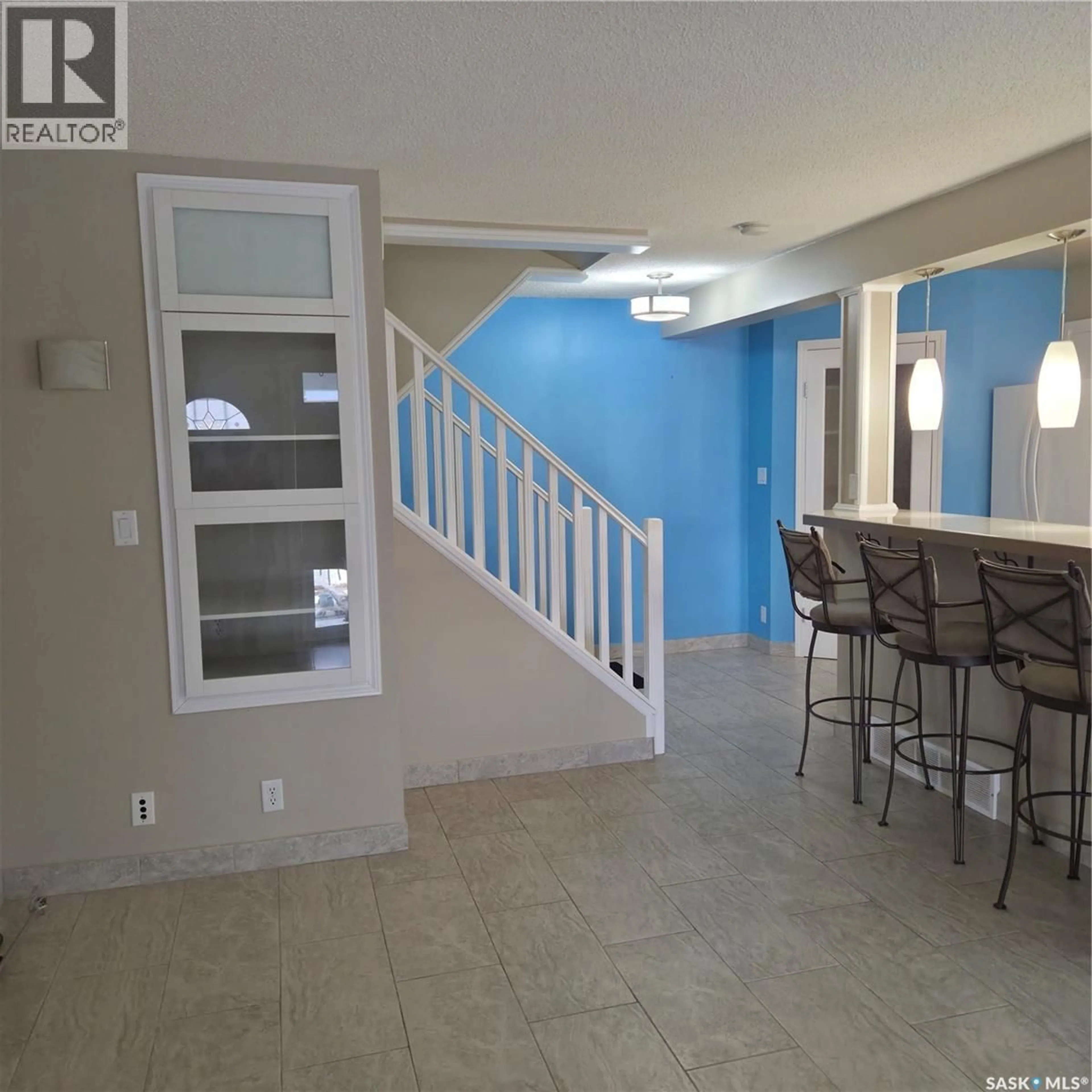 Open concept kitchen, ceramic/tile floor for 17 1292 GORDON ROAD, Moose Jaw Saskatchewan S6H3E5