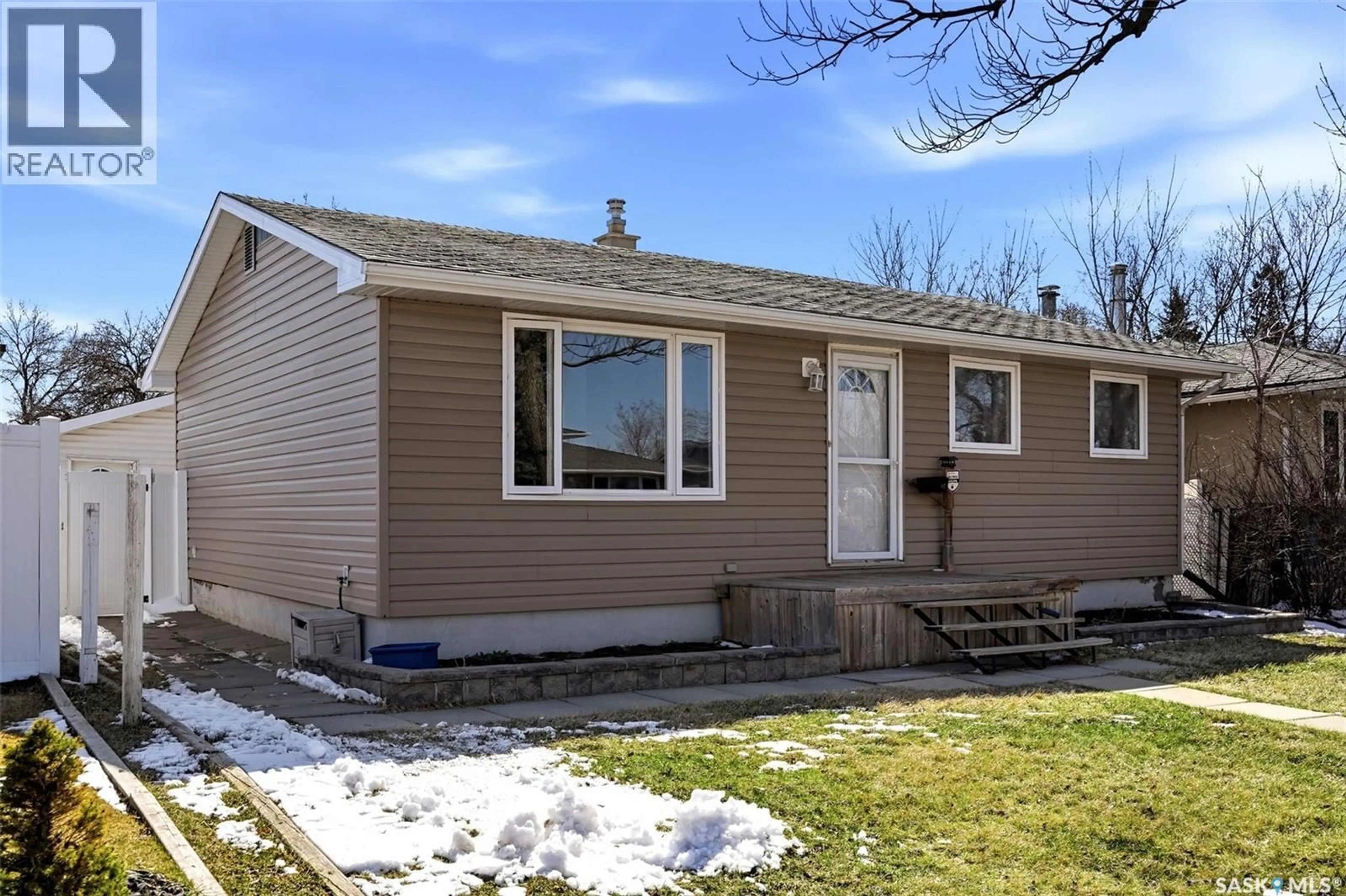 Home with vinyl exterior material, street for 87 CARMICHAEL ROAD, Regina Saskatchewan S4R0C6