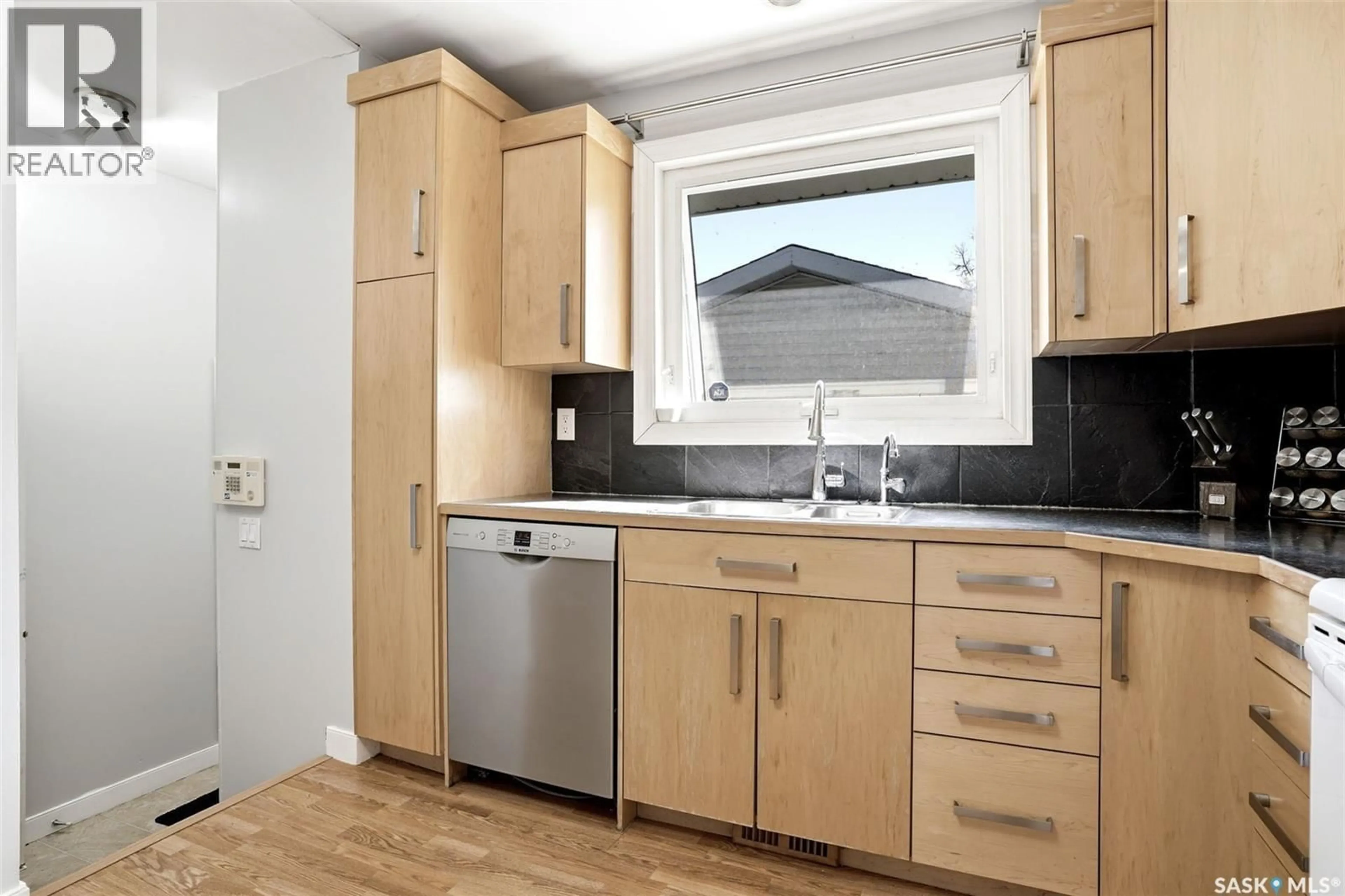 Standard kitchen, wood/laminate floor for 87 CARMICHAEL ROAD, Regina Saskatchewan S4R0C6