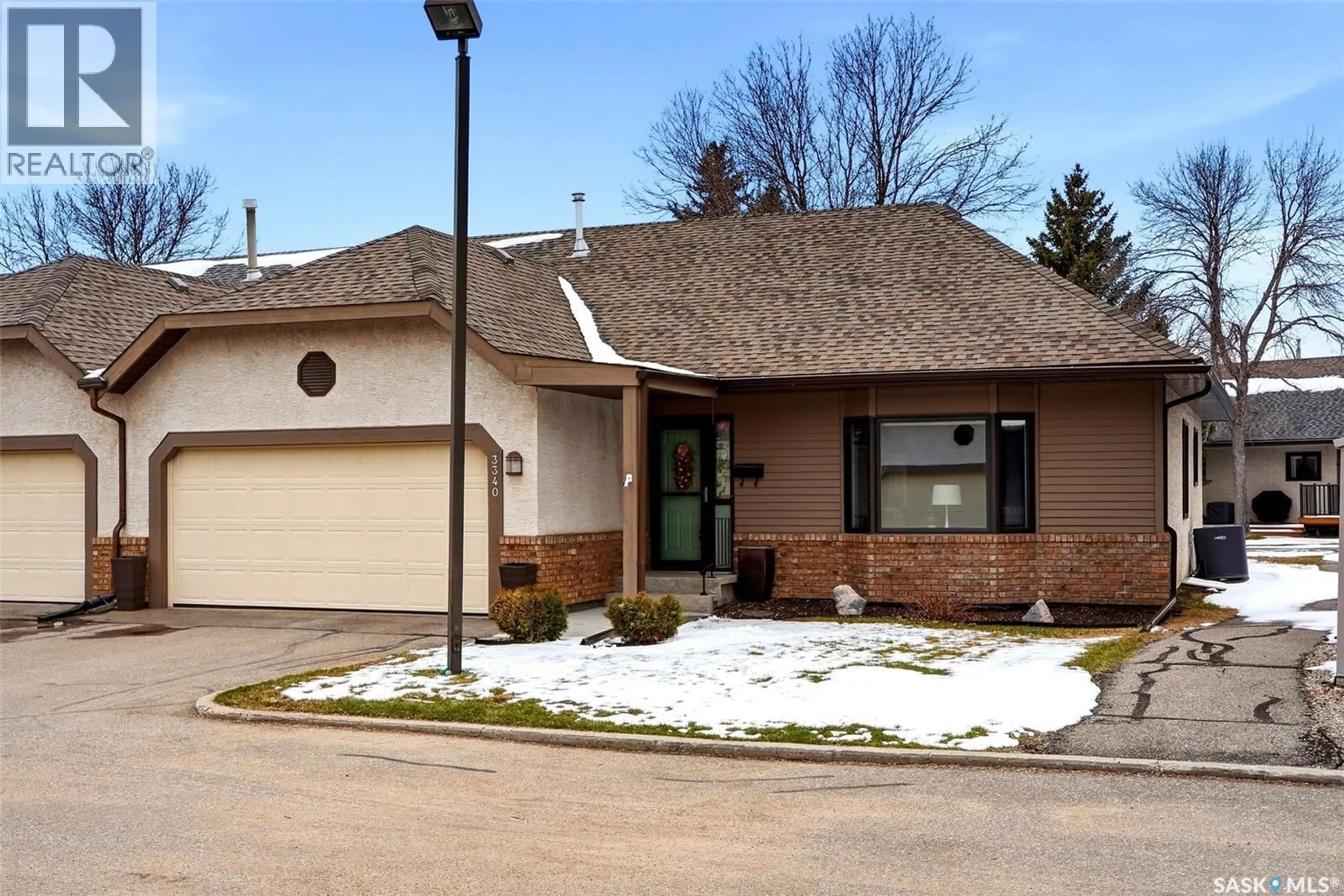 Home with brick exterior material, street for 3340 BROOKSHIRE LANE, Regina Saskatchewan S4V2R1