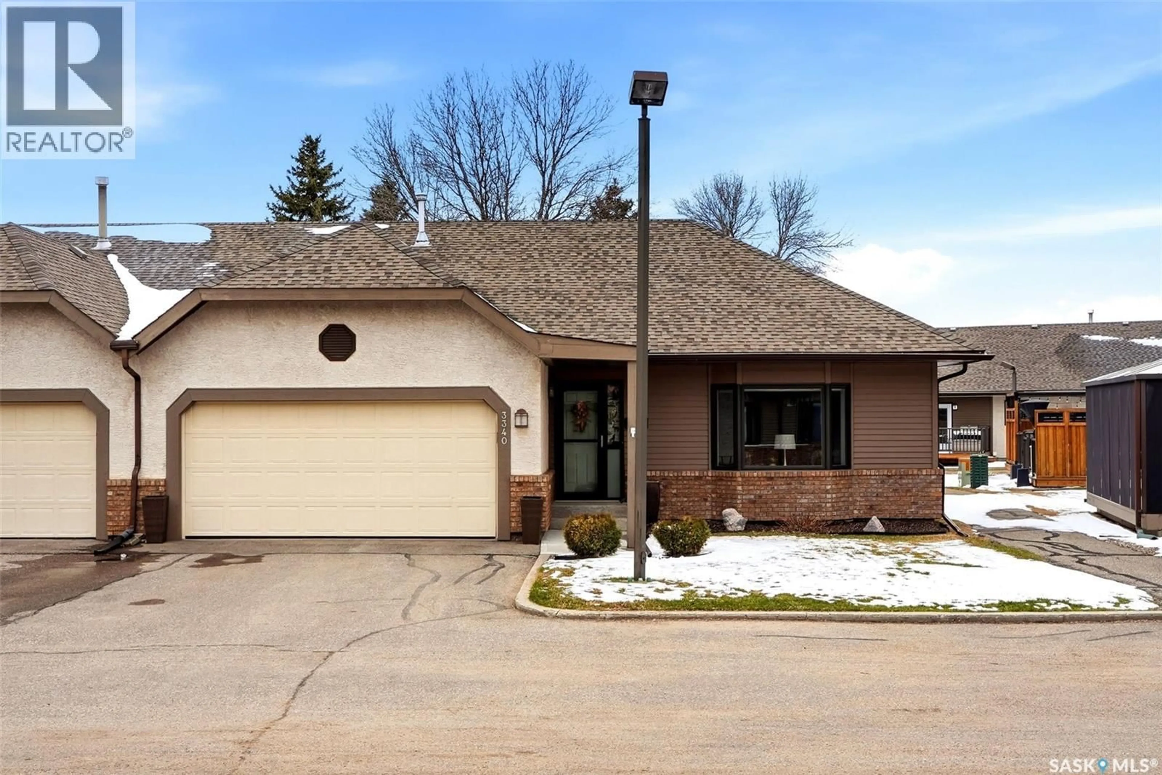 Home with brick exterior material, street for 3340 BROOKSHIRE LANE, Regina Saskatchewan S4V2R1