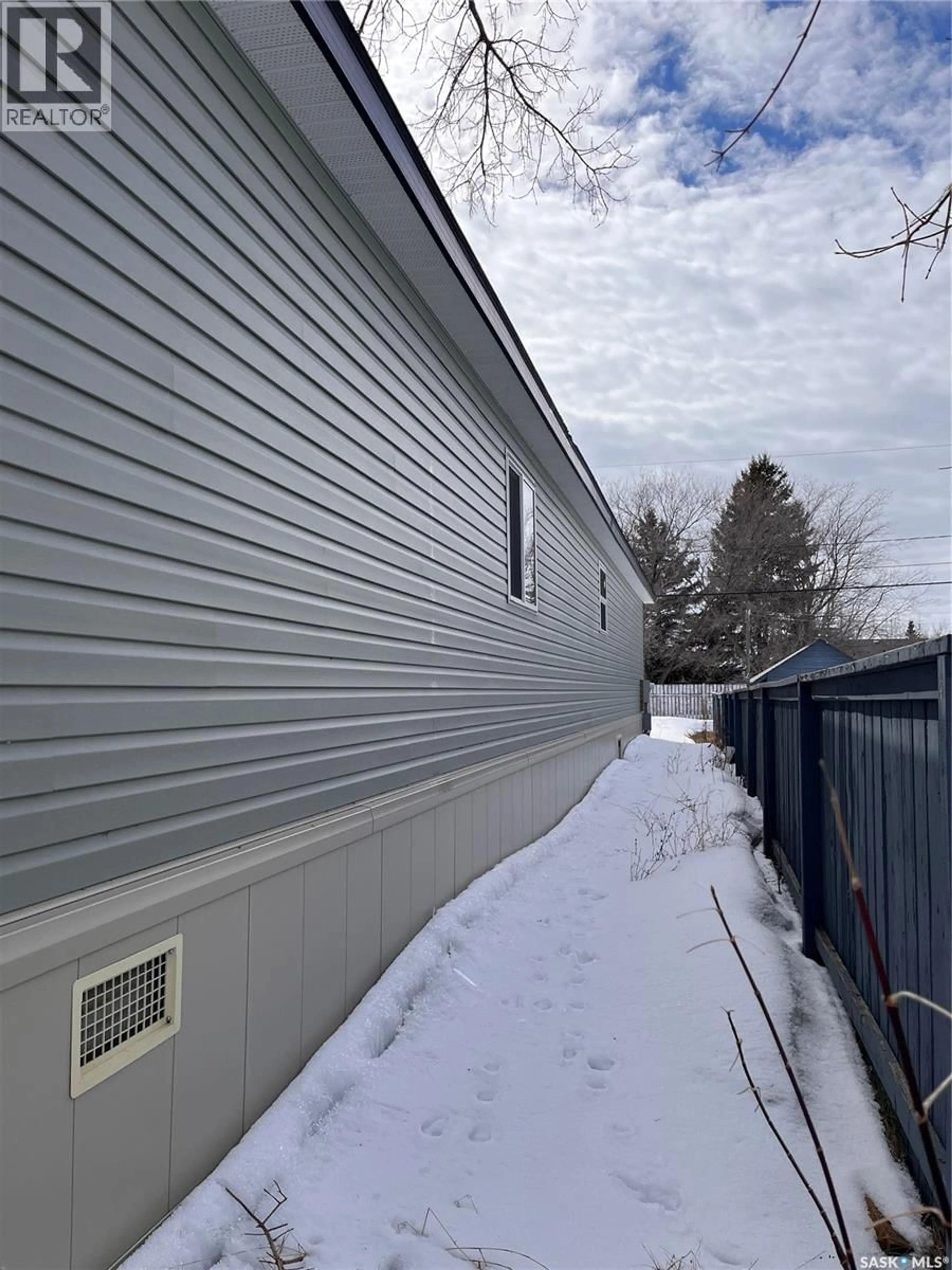 Home with vinyl exterior material, building for 218 4TH STREET, Nipawin Saskatchewan S0E1E0