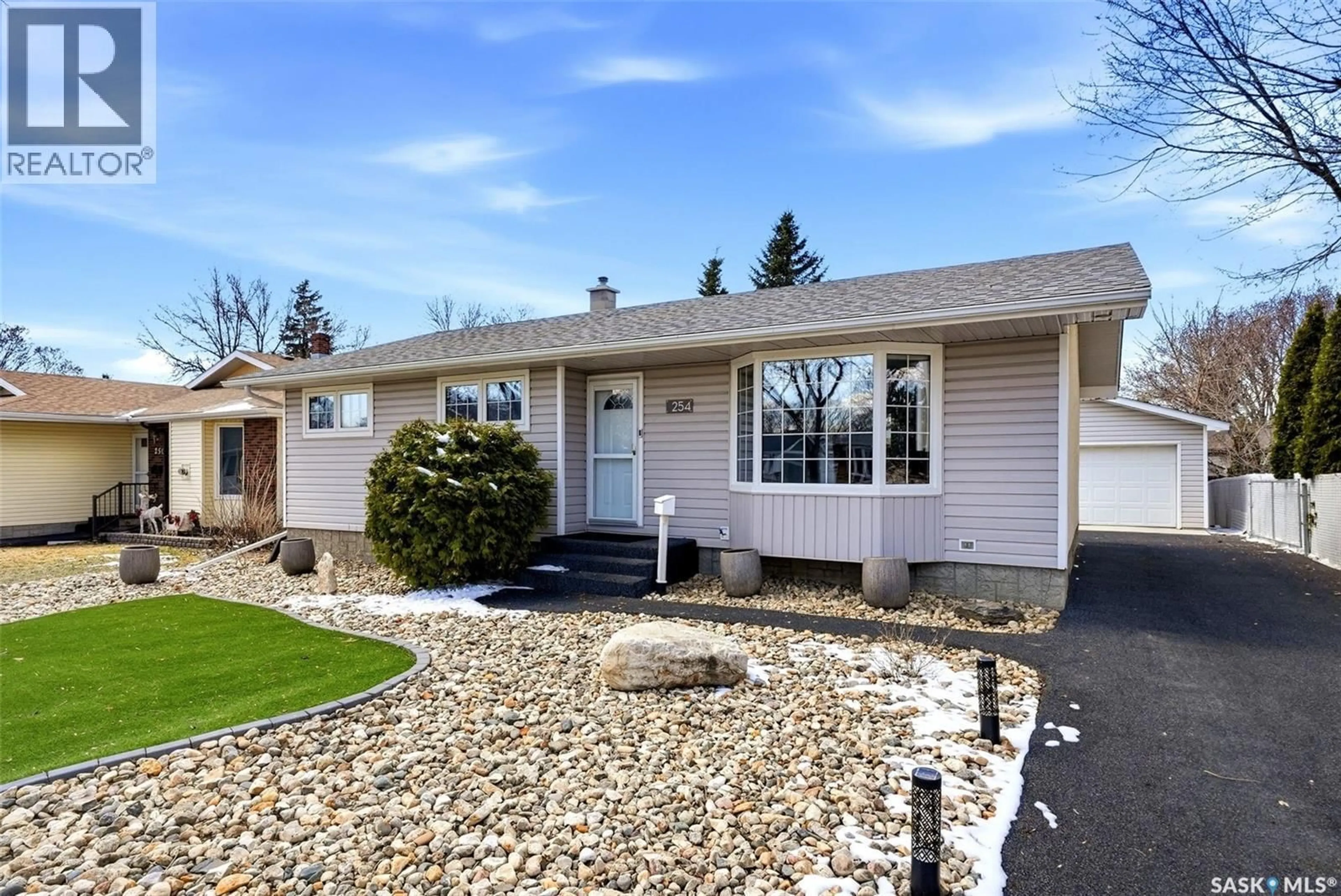 Home with vinyl exterior material, street for 254 WELLS STREET, Regina Saskatchewan S4R6T2