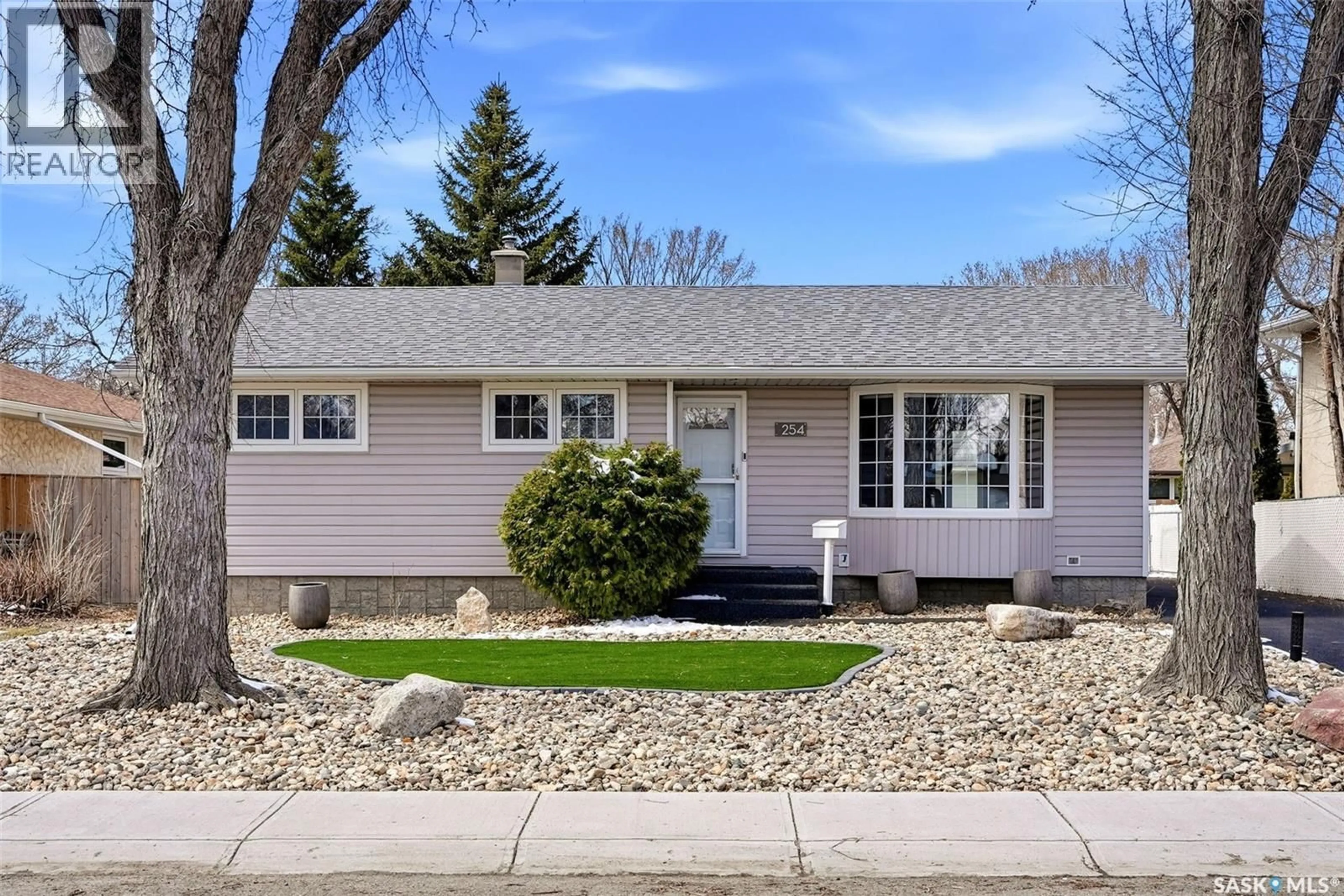 Home with vinyl exterior material, street for 254 WELLS STREET, Regina Saskatchewan S4R6T2