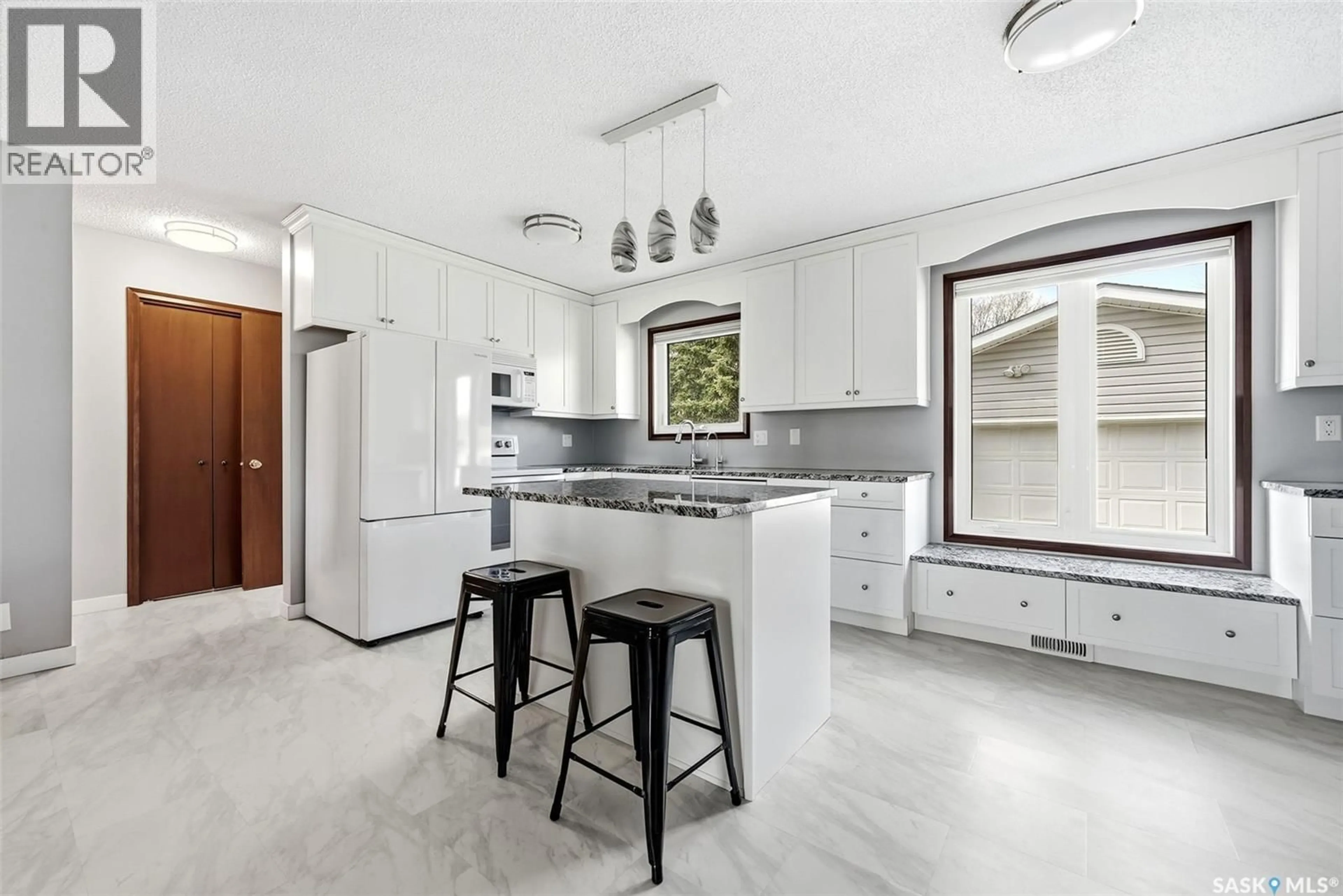 Open concept kitchen, ceramic/tile floor for 254 WELLS STREET, Regina Saskatchewan S4R6T2