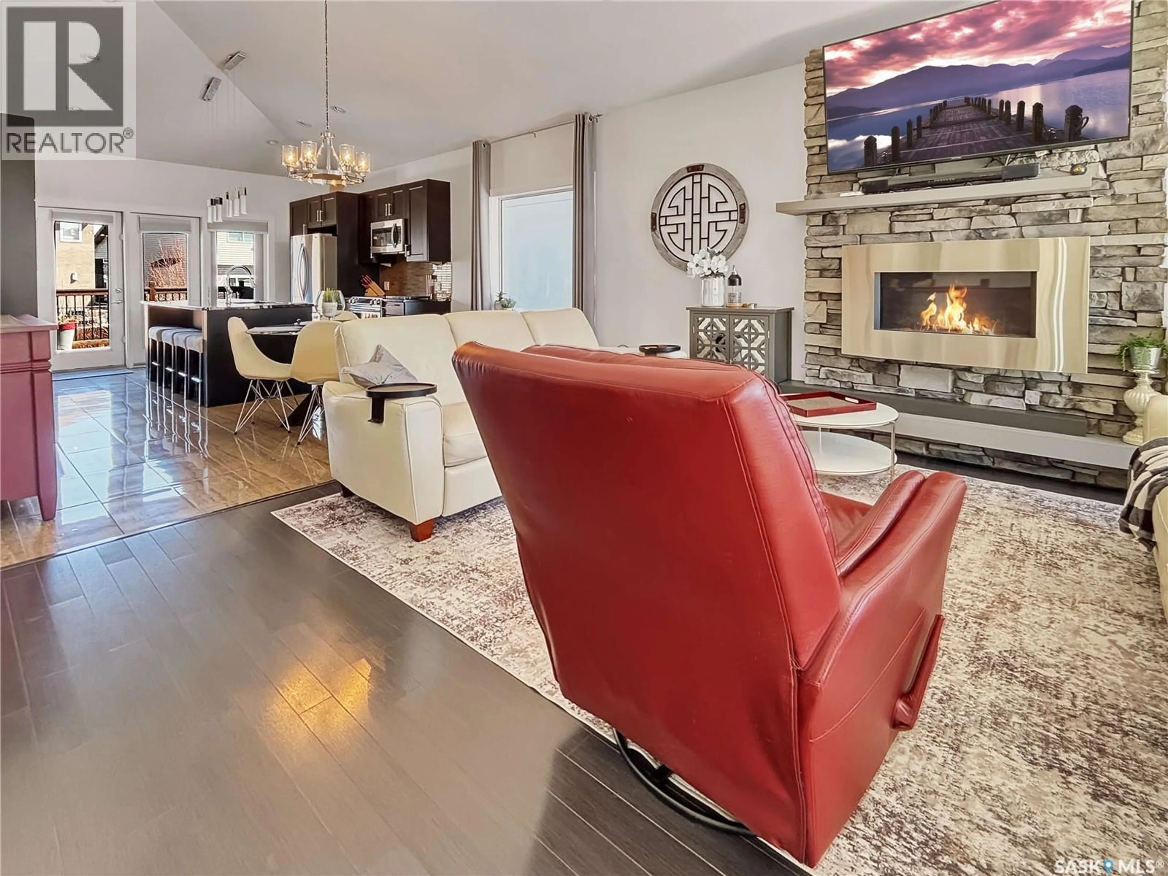 Living room with furniture, ceramic/tile floor for 451 HASTINGS CRESCENT, Saskatoon Saskatchewan S7V0C8
