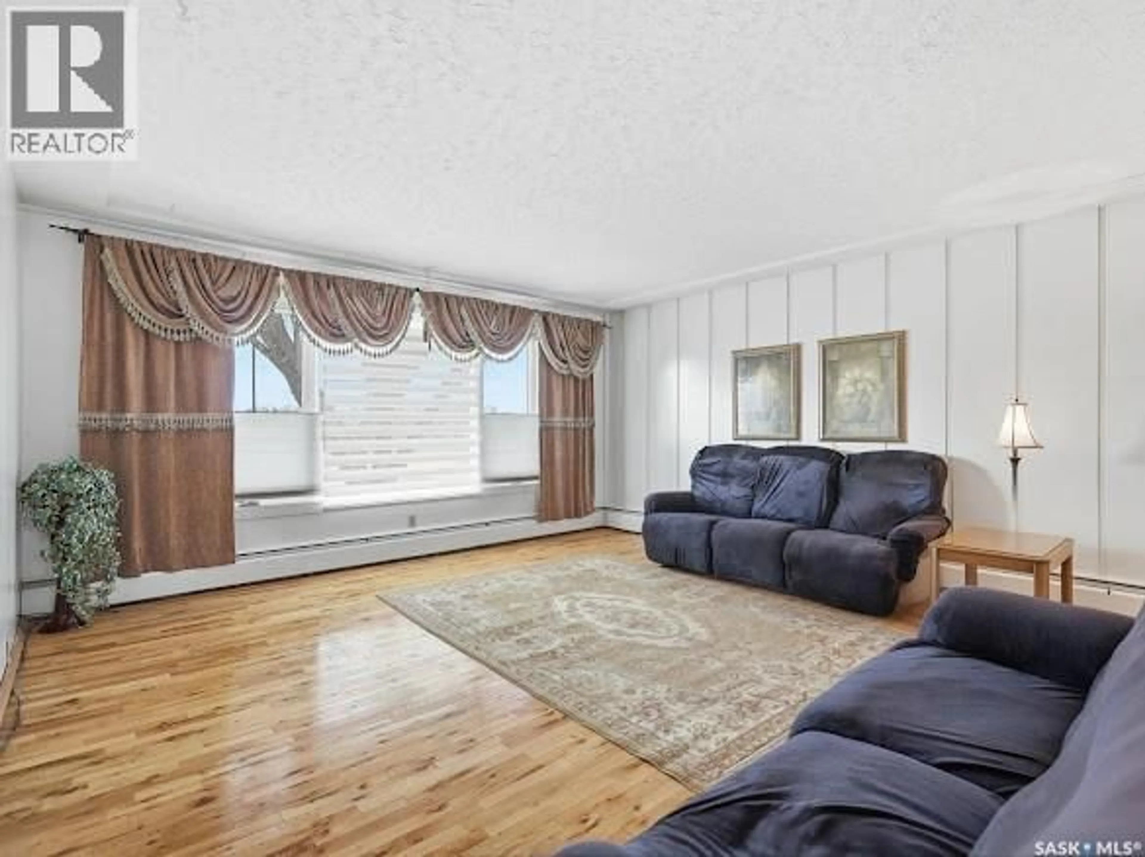 Living room with furniture, unknown for 19 DIXON CRESCENT, Regina Saskatchewan S4N1V3