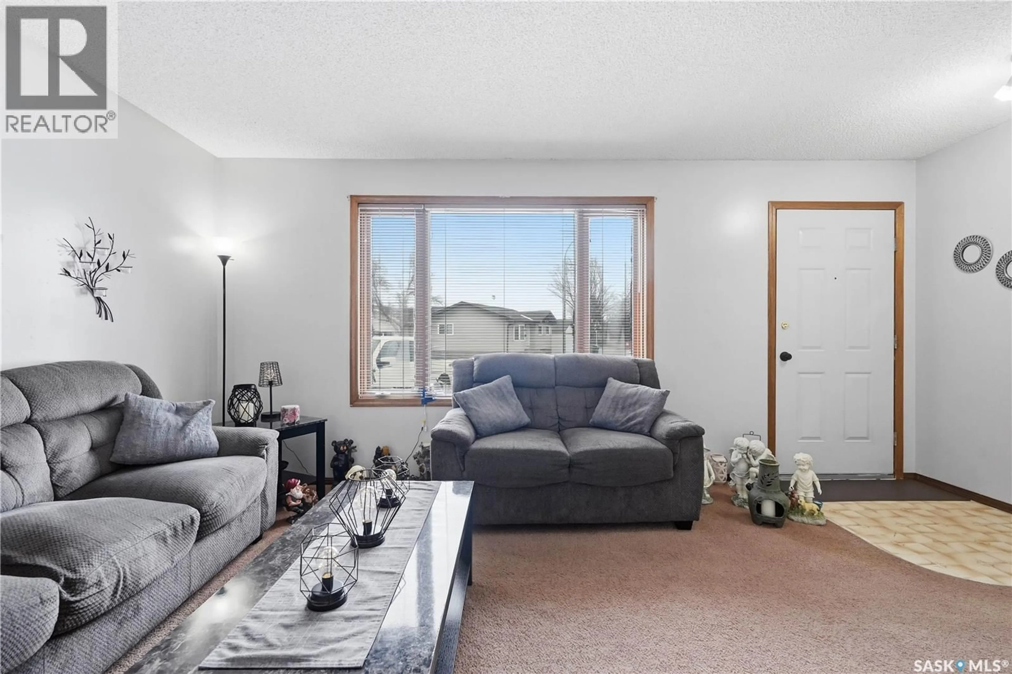 Living room with furniture, unknown for 950 BERCOVICH CRESCENT, Regina Saskatchewan S4N7J7