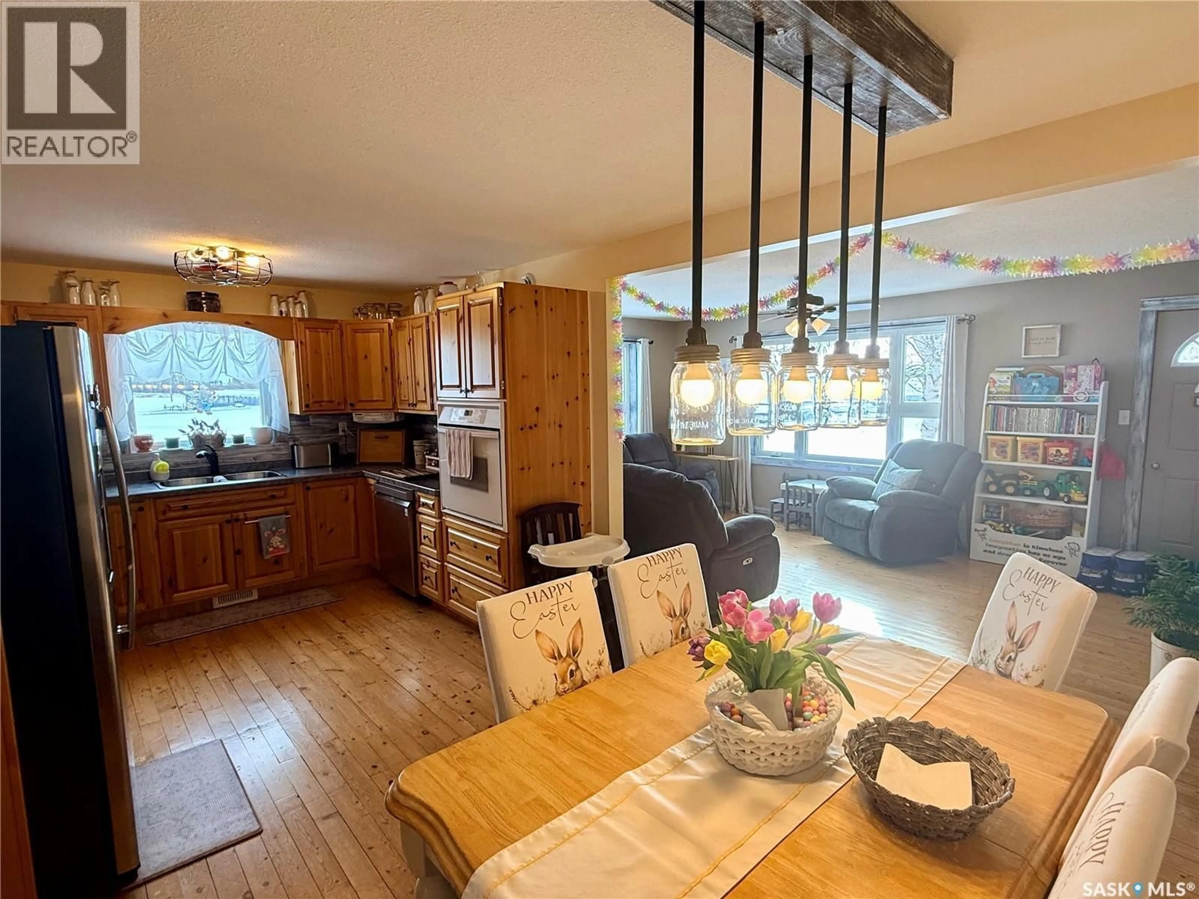 Open concept kitchen, wood/laminate floor for YELLAND ACREAGE, Torch River Rm No. 488 Saskatchewan S0E1E0
