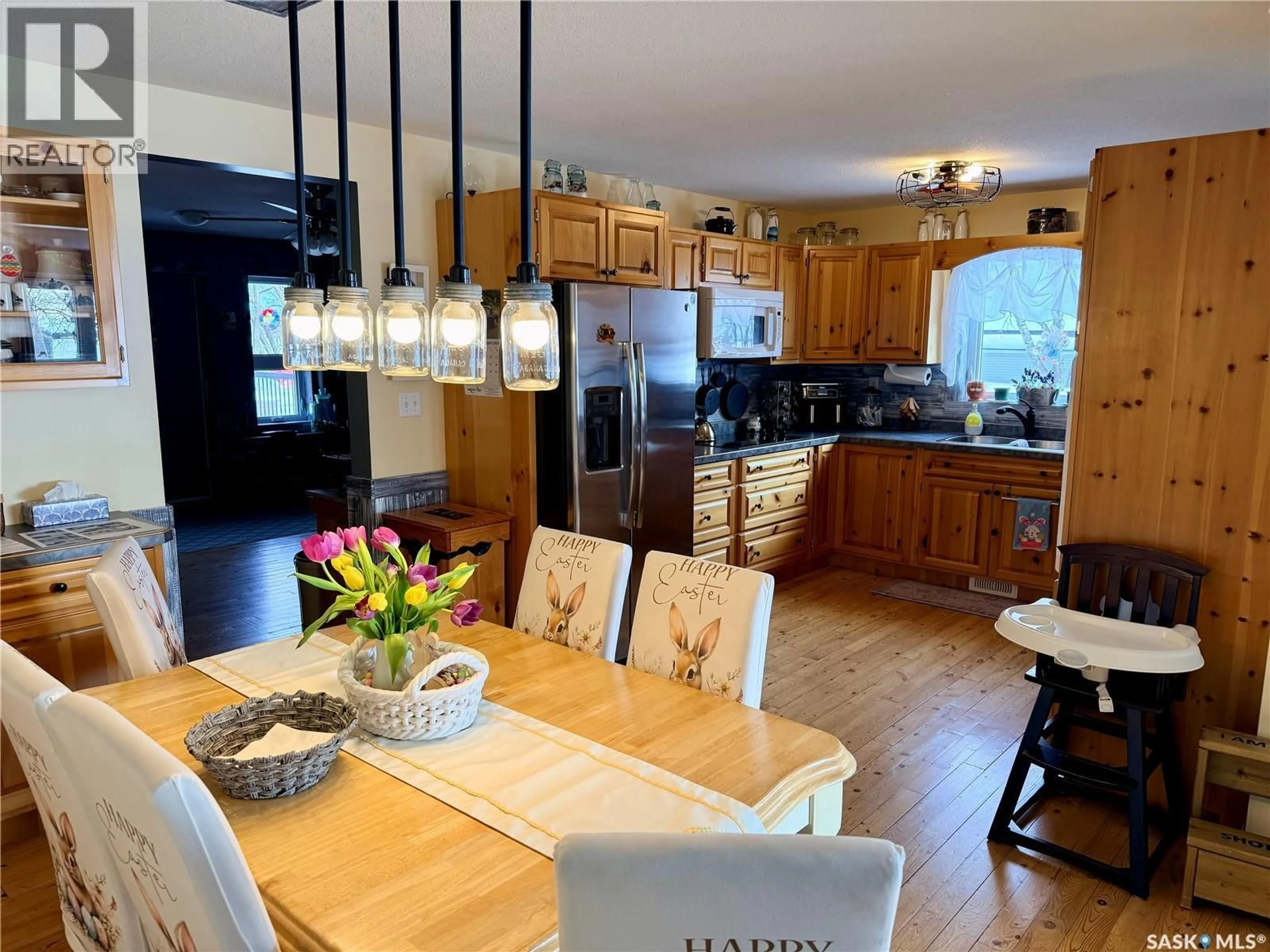 Open concept kitchen, wood/laminate floor for YELLAND ACREAGE, Torch River Rm No. 488 Saskatchewan S0E1E0