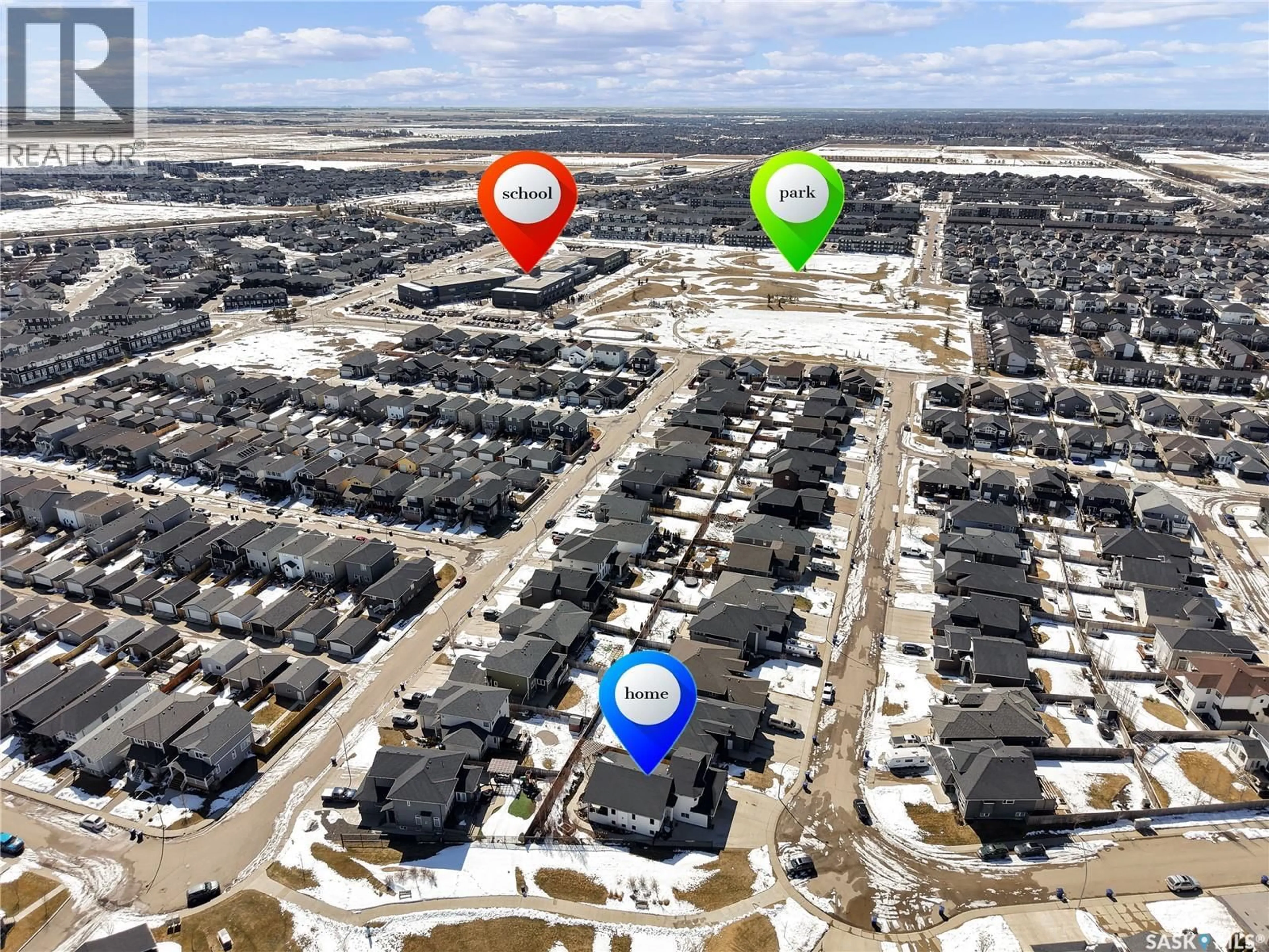 A pic from outside/outdoor area/front of a property/back of a property/a pic from drone, street for 803 SALLOUM CRESCENT, Saskatoon Saskatchewan S7W0N3