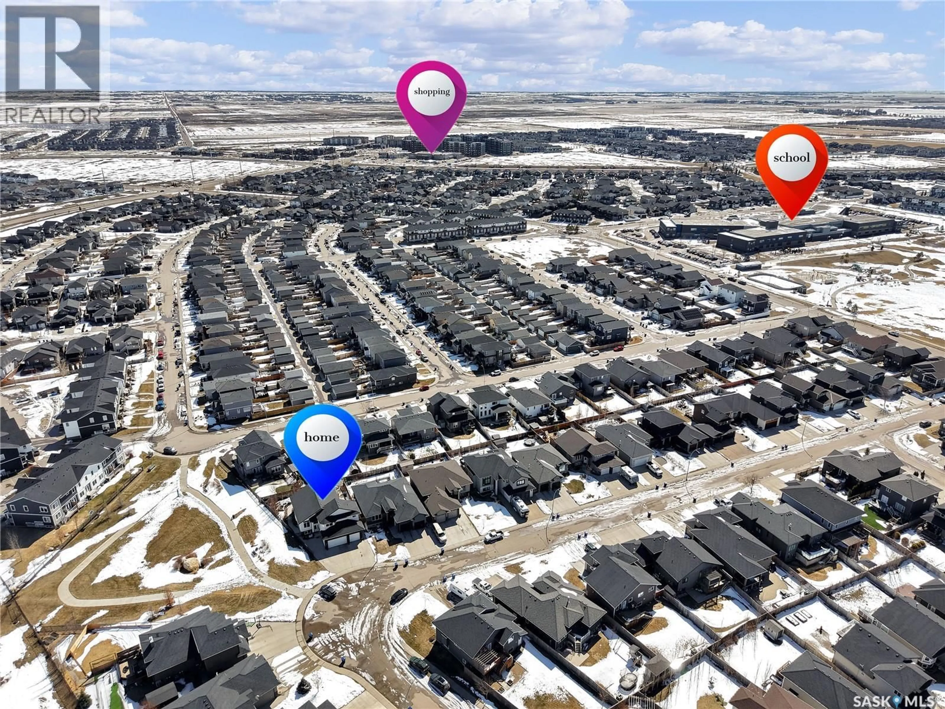 A pic from outside/outdoor area/front of a property/back of a property/a pic from drone, street for 803 SALLOUM CRESCENT, Saskatoon Saskatchewan S7W0N3