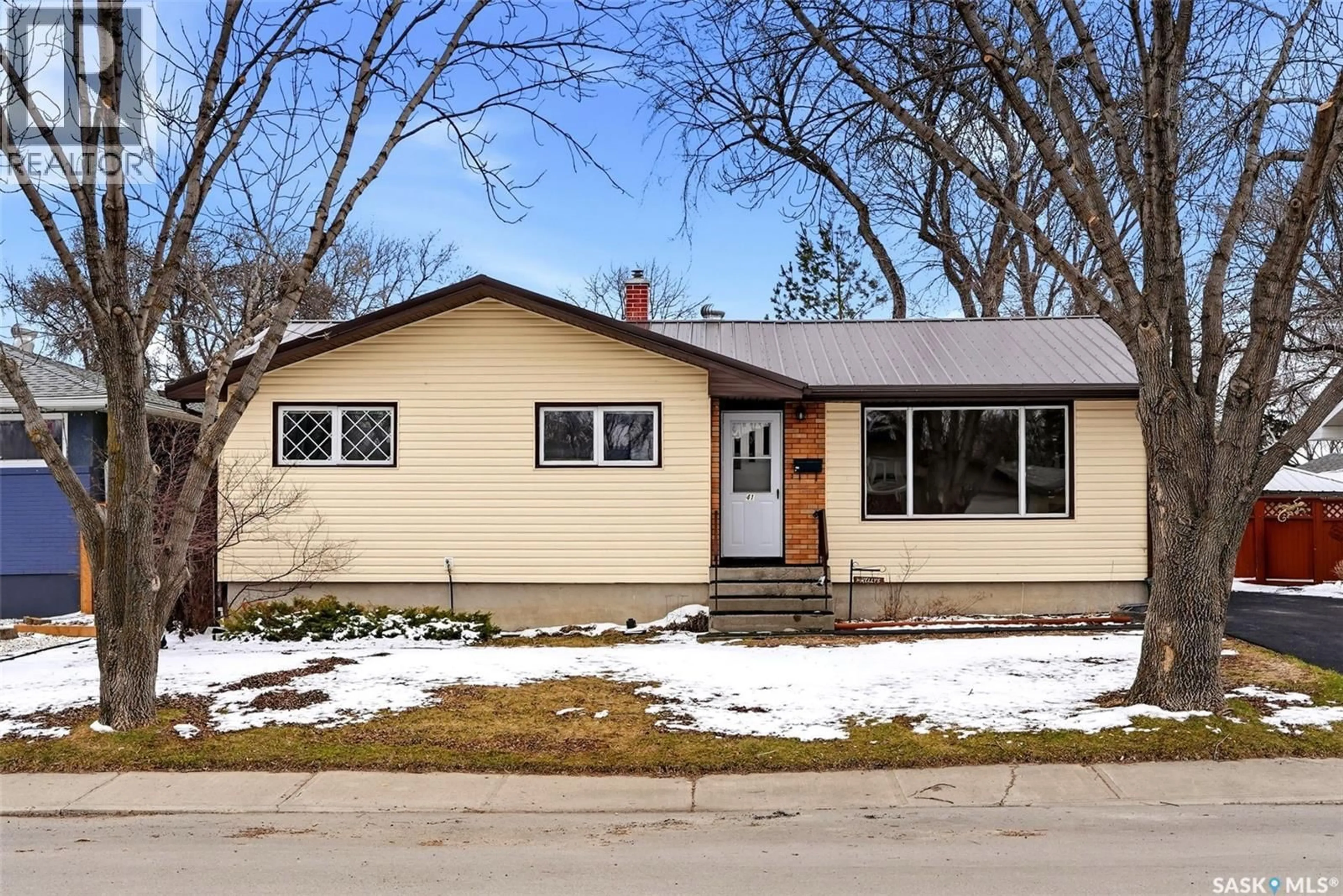 Home with vinyl exterior material, street for 41 MCCORMICK CRESCENT, Regina Saskatchewan S4T6J9