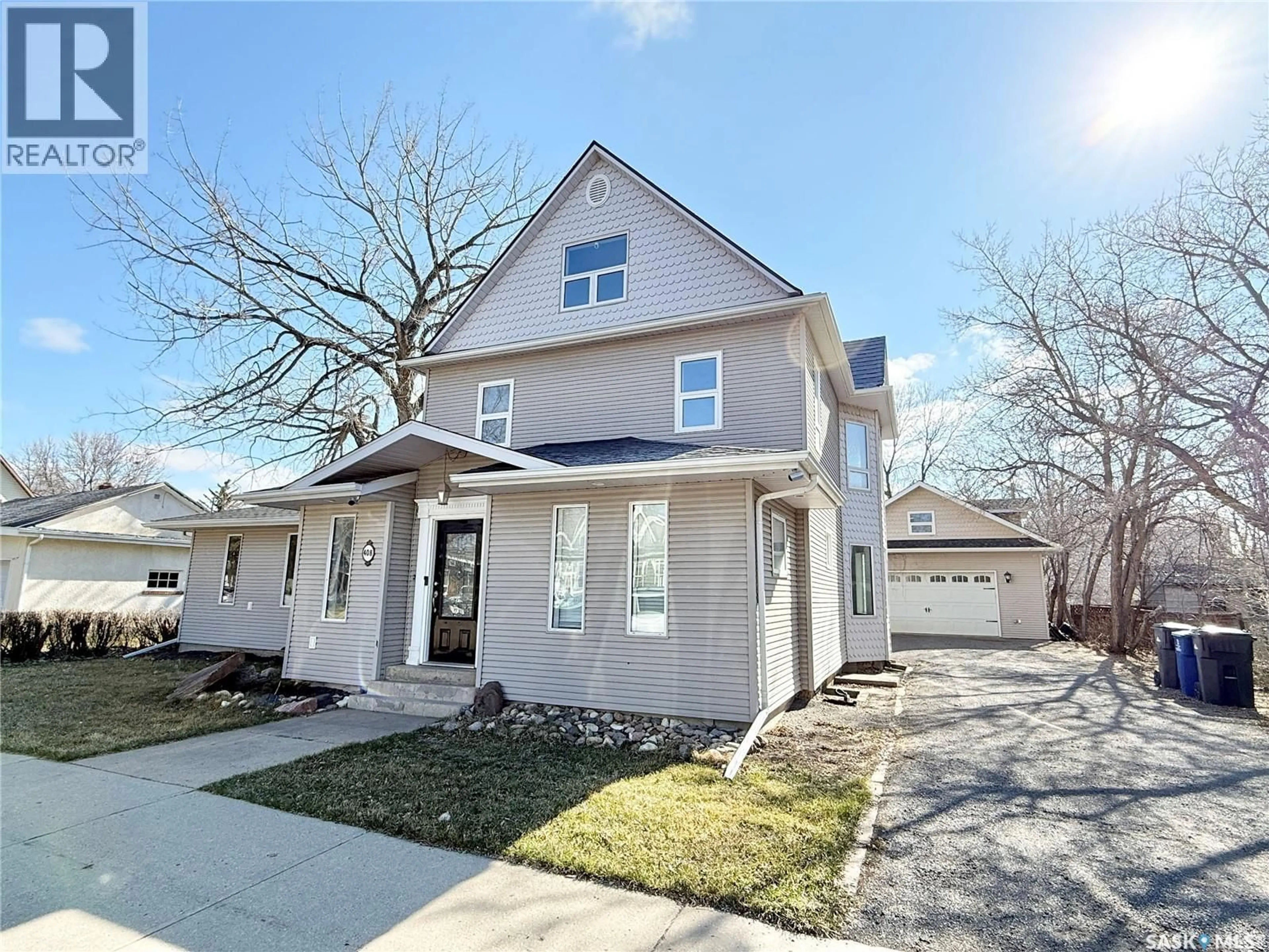 Home with brick exterior material, street for 408 ASSINIBOIA STREET, Weyburn Saskatchewan S4H0R6