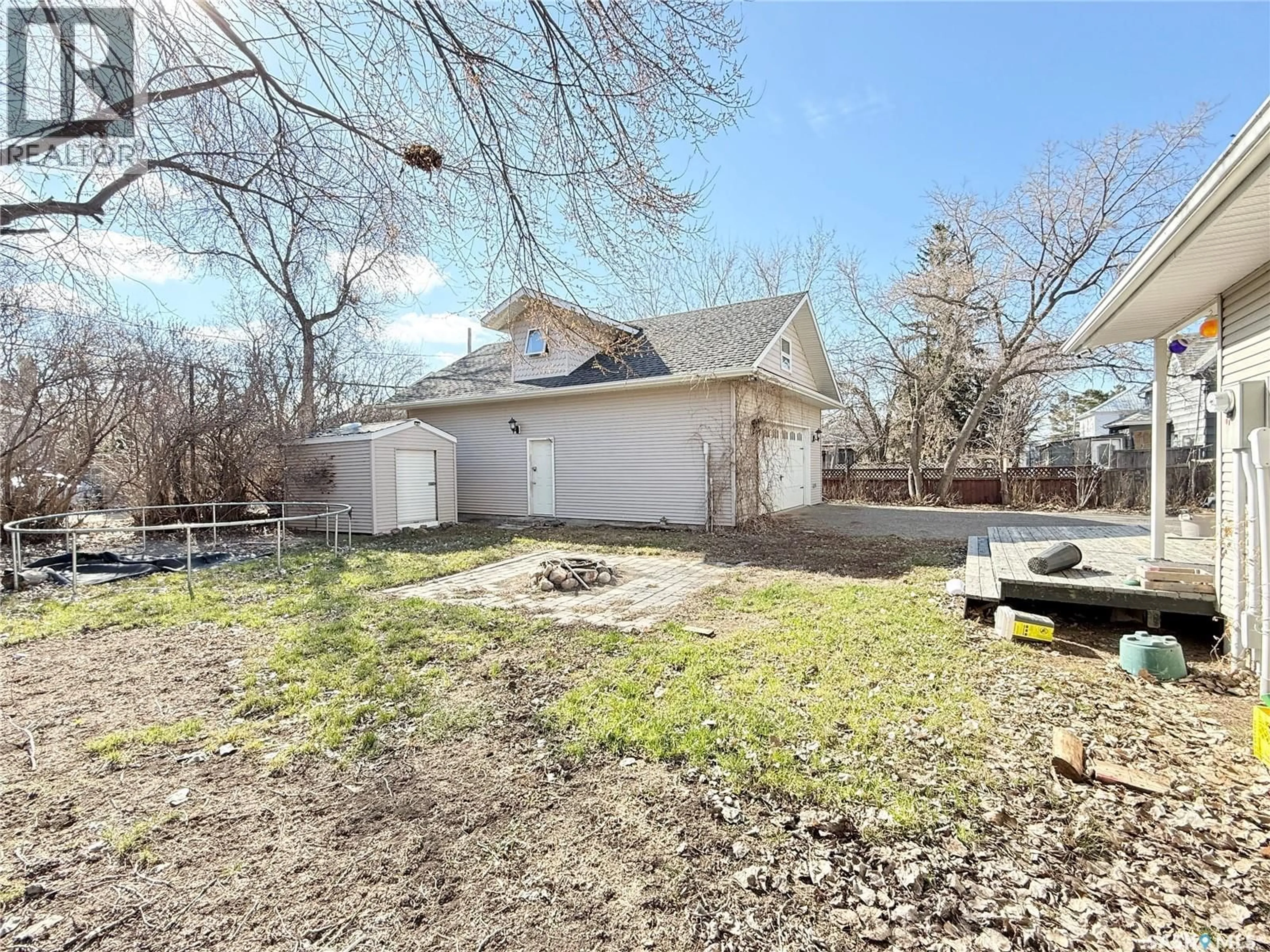 A pic from outside/outdoor area/front of a property/back of a property/a pic from drone, street for 408 ASSINIBOIA STREET, Weyburn Saskatchewan S4H0R6
