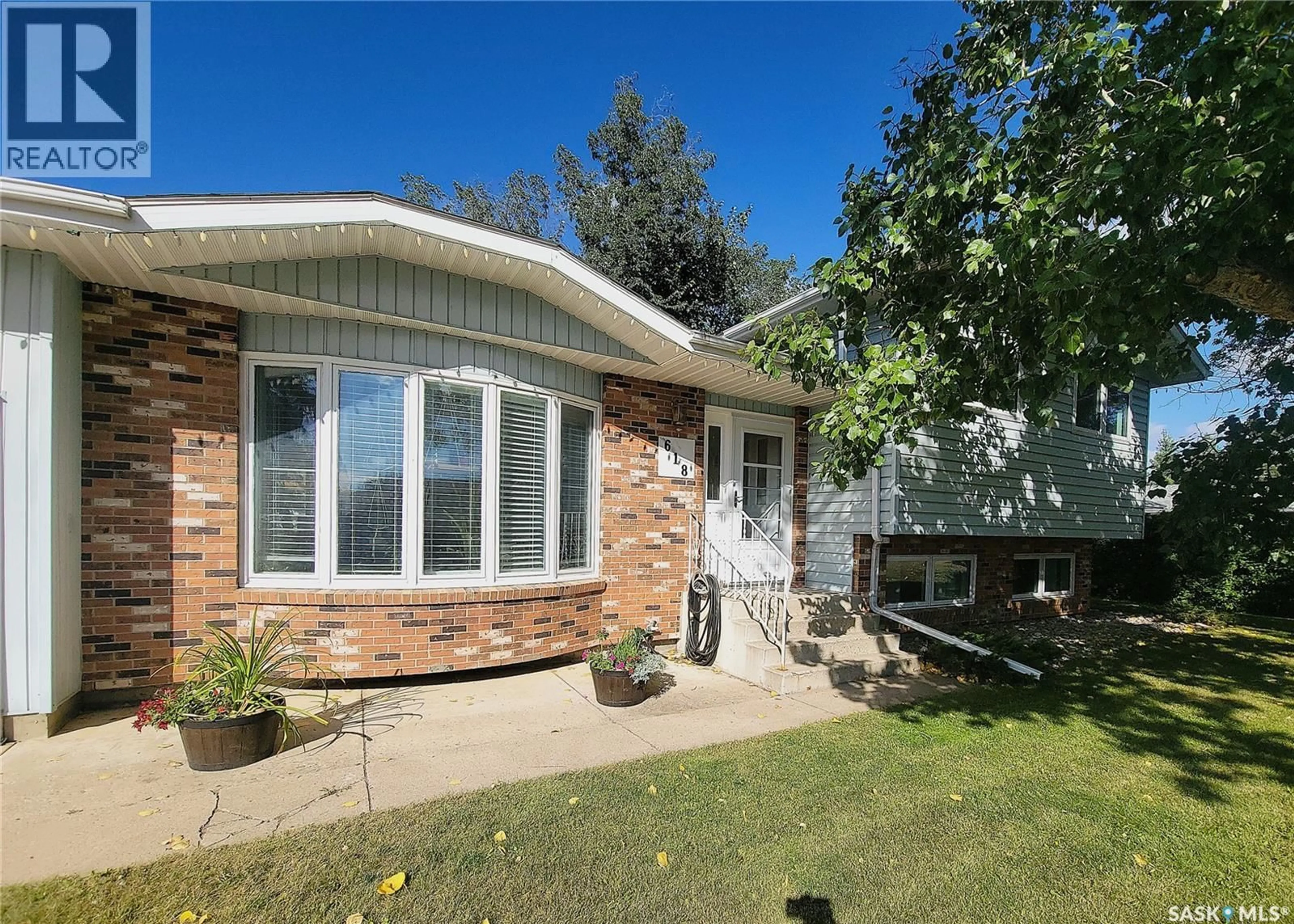 Home with vinyl exterior material, street for 618 CLOVER AVENUE, Dalmeny Saskatchewan S0K1E0