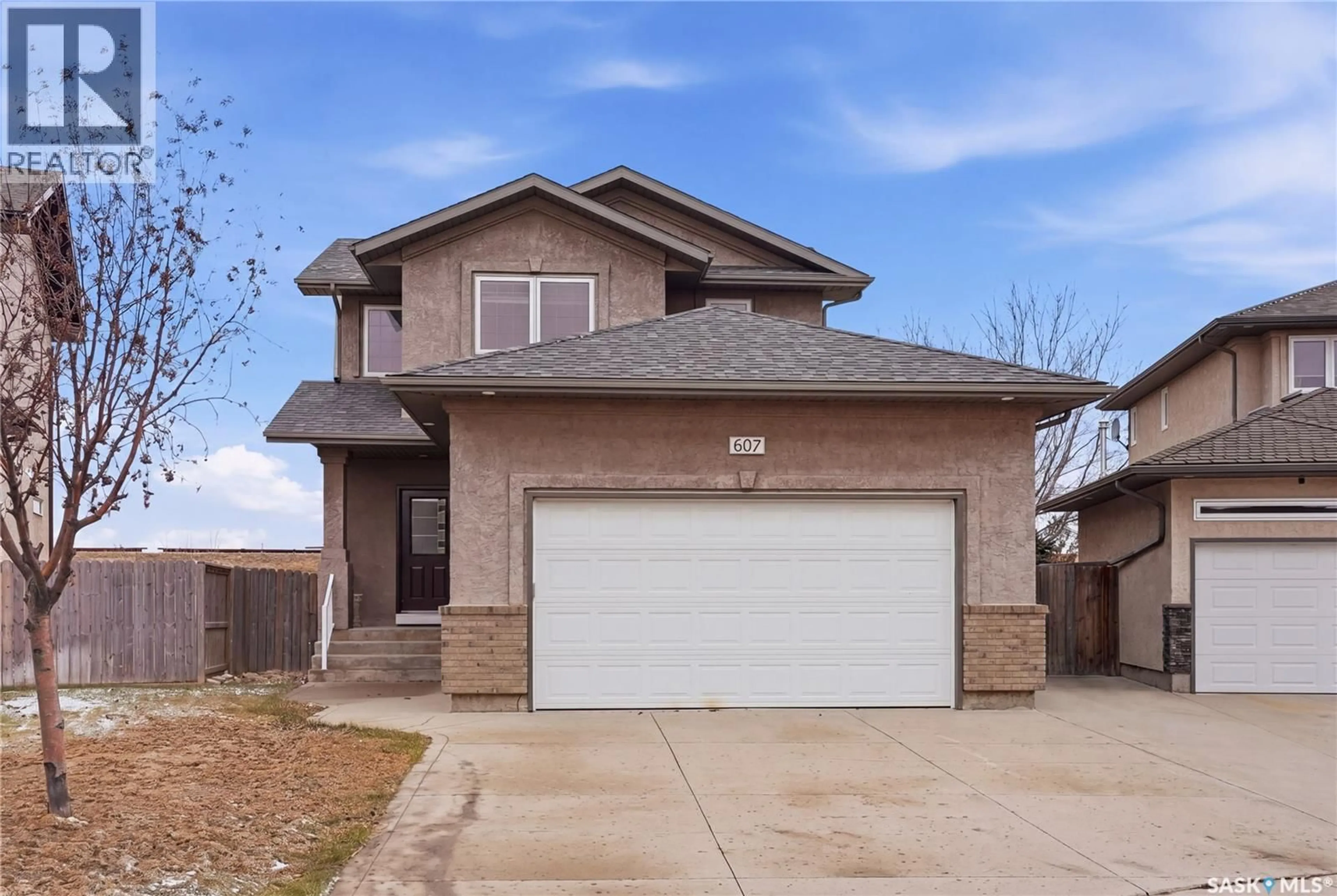 Home with brick exterior material, street for 607 BECKETT CRESCENT, Saskatoon Saskatchewan S7N4X3