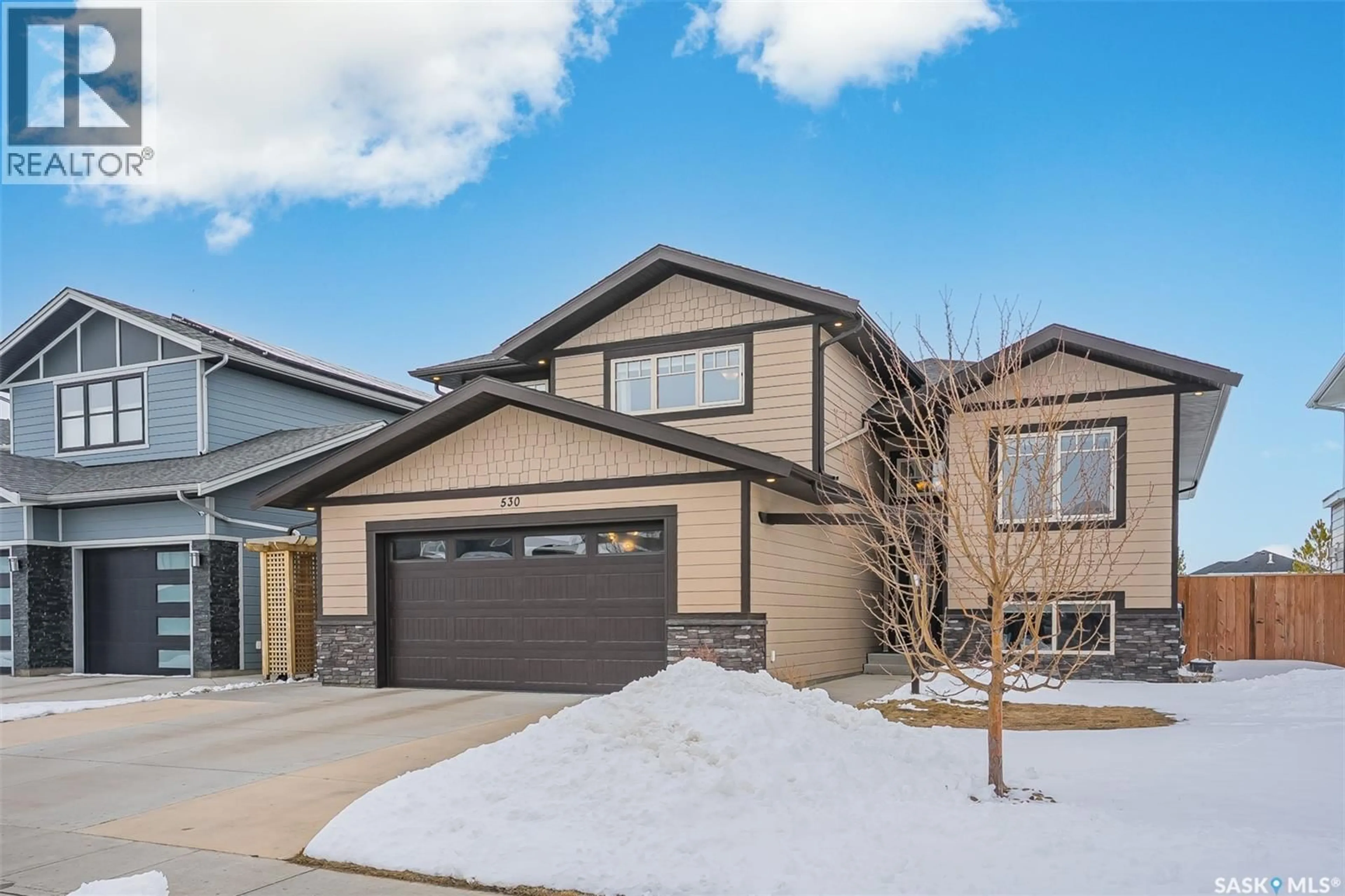 Home with vinyl exterior material, street for 530 DAGNONE CRESCENT, Saskatoon Saskatchewan S7V0P8