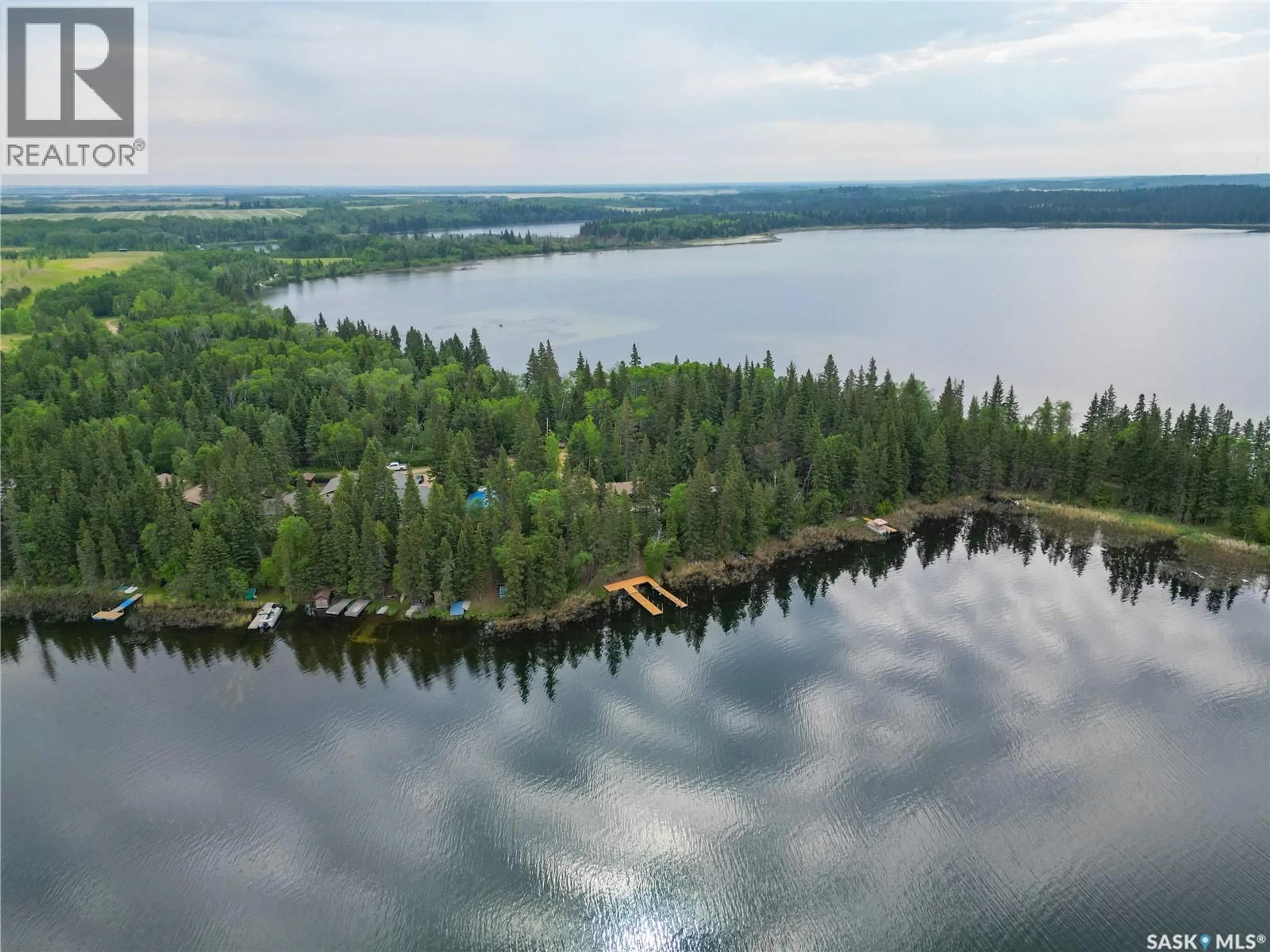 A pic from outside/outdoor area/front of a property/back of a property/a pic from drone, water/lake/river/ocean view for 224 KINGFISHER DRIVE, Canwood Rm No. 494 Saskatchewan S0J0K0