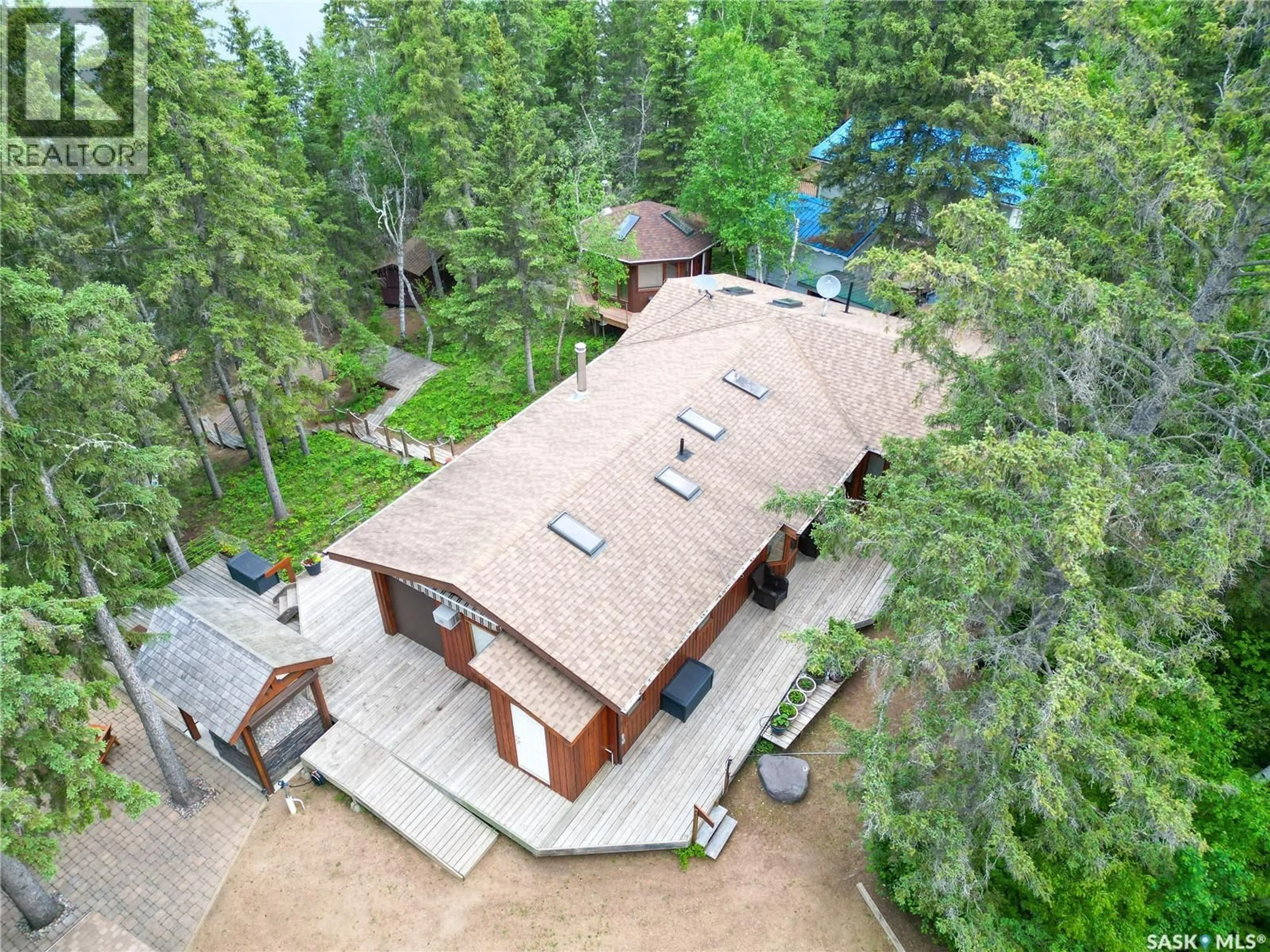 A pic from outside/outdoor area/front of a property/back of a property/a pic from drone, forest/trees view for 224 KINGFISHER DRIVE, Canwood Rm No. 494 Saskatchewan S0J0K0