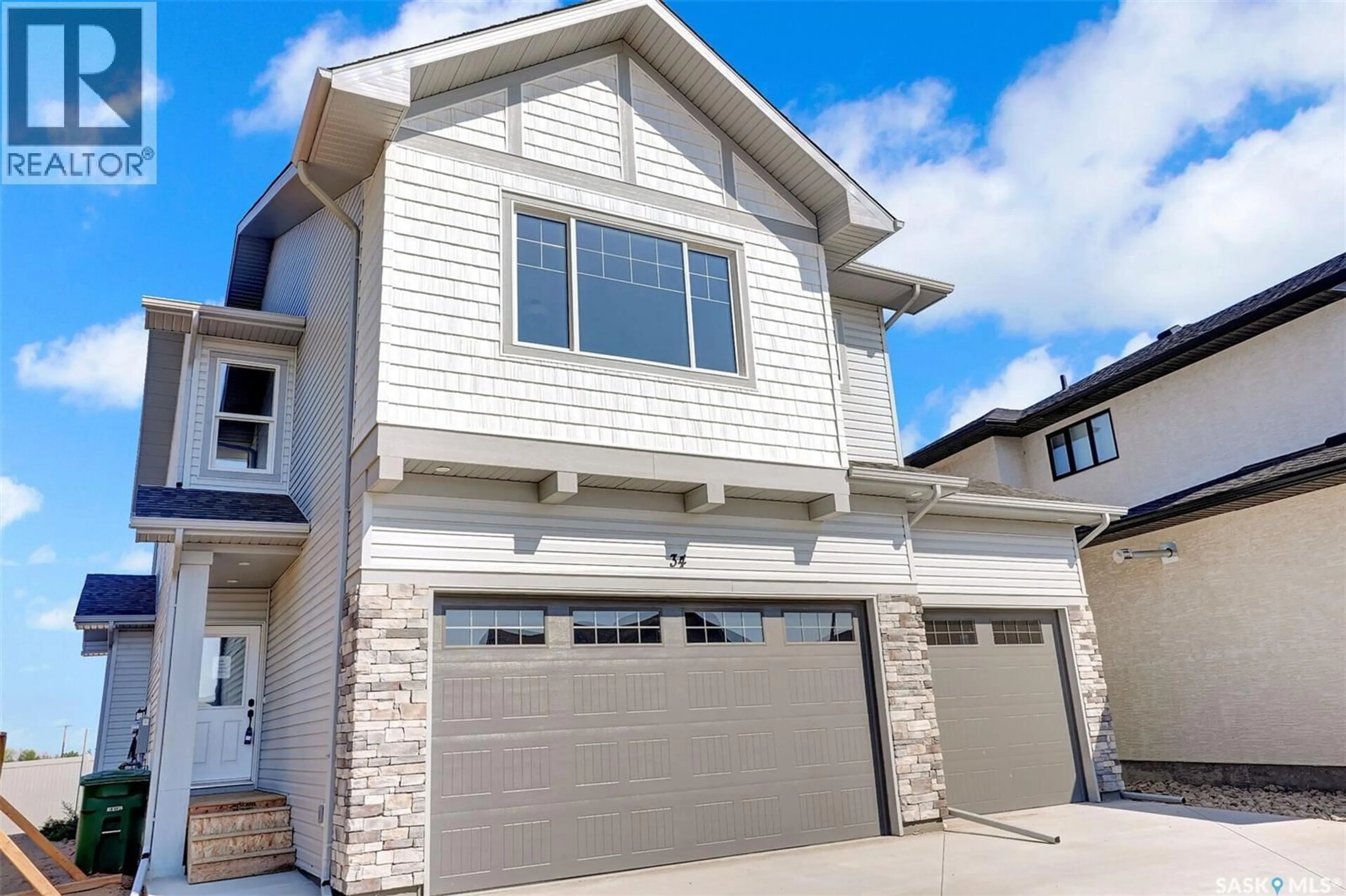 Home with vinyl exterior material, street for 266 KOSTIUK CRESCENT, Saskatoon Saskatchewan S7V2A3