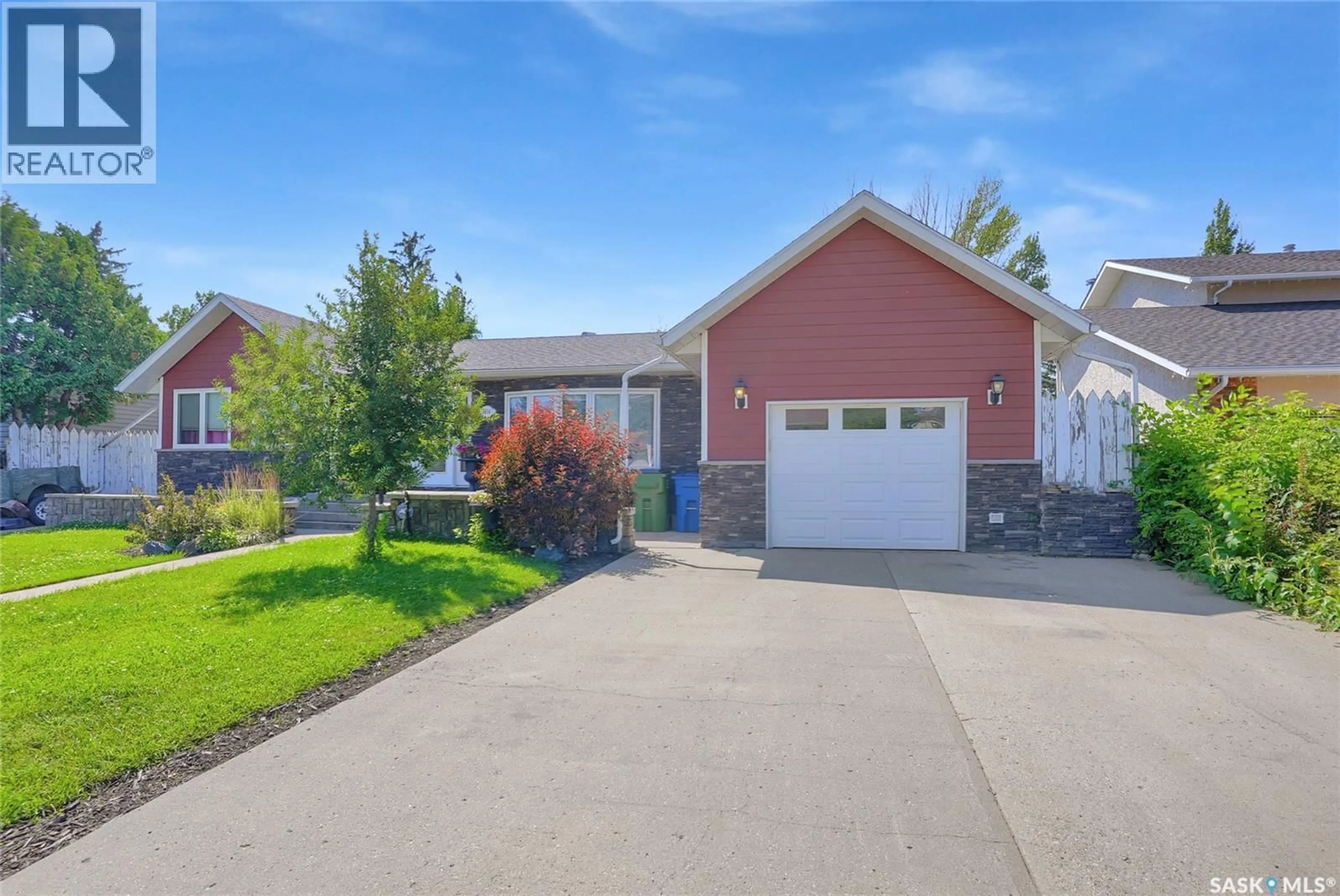 Home with vinyl exterior material, street for 1614 11TH AVENUE, Moose Jaw Saskatchewan S6H6W9