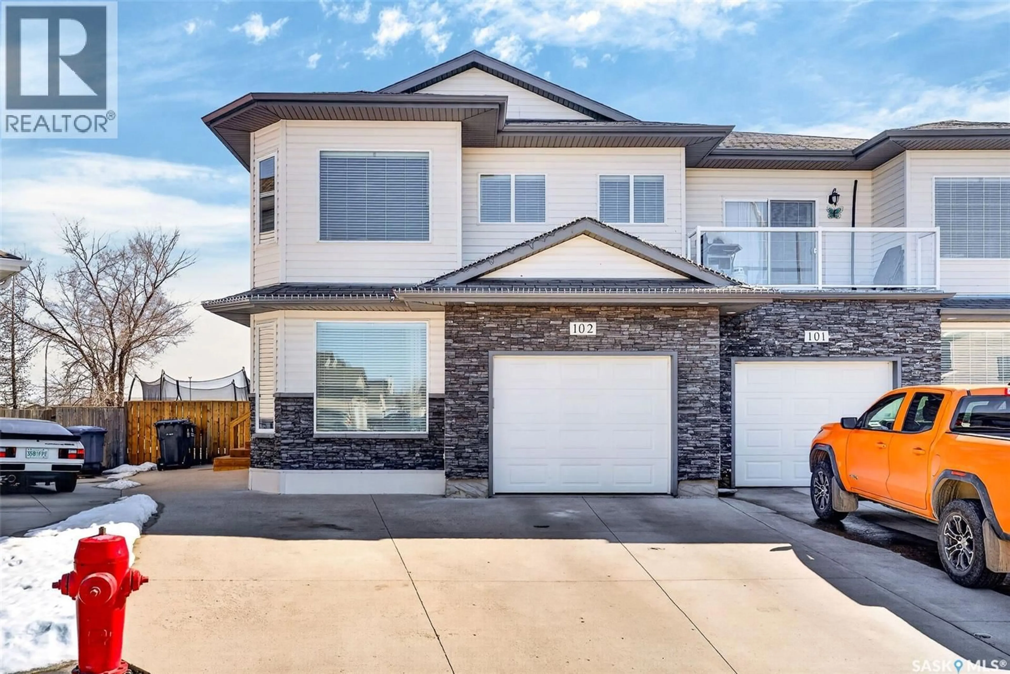 Home with brick exterior material, street for 102 MEADOWLARK PARK, Warman Saskatchewan S0K0A1