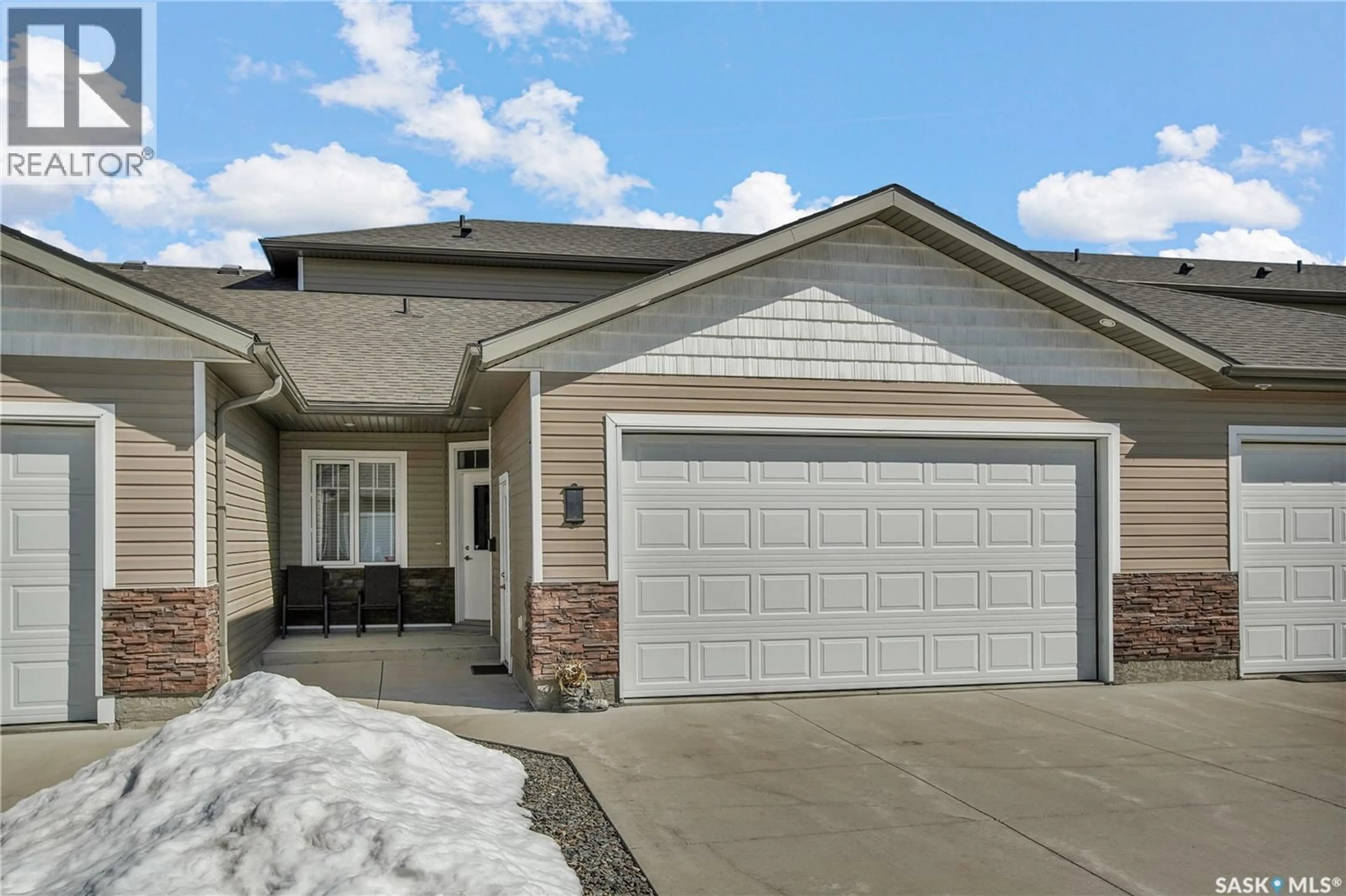Home with vinyl exterior material, street for 44 100 BROOKLYN LANE, Warman Saskatchewan S0K0A1