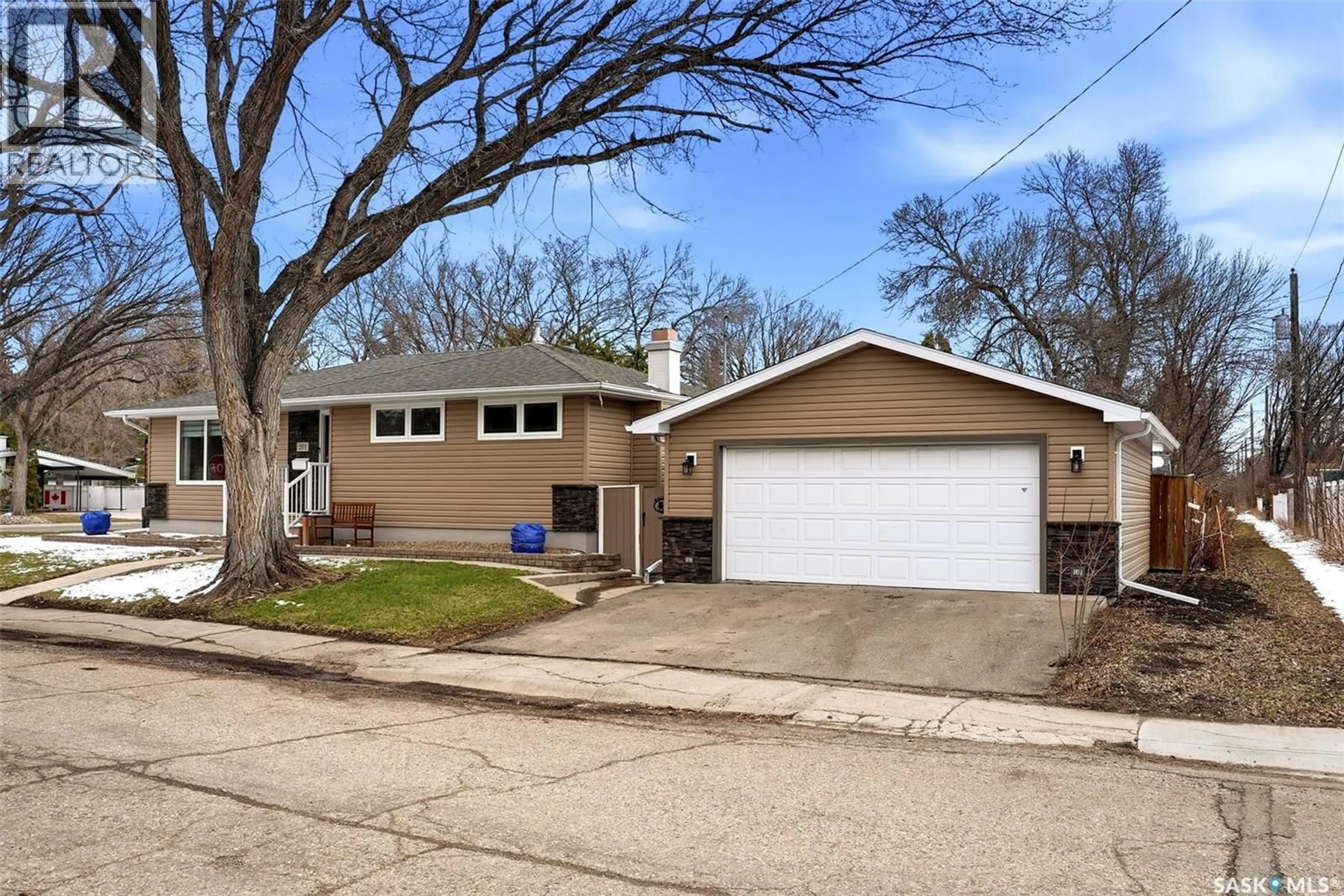 Home with vinyl exterior material, street for 201 SHANNON ROAD, Regina Saskatchewan S4S5H8