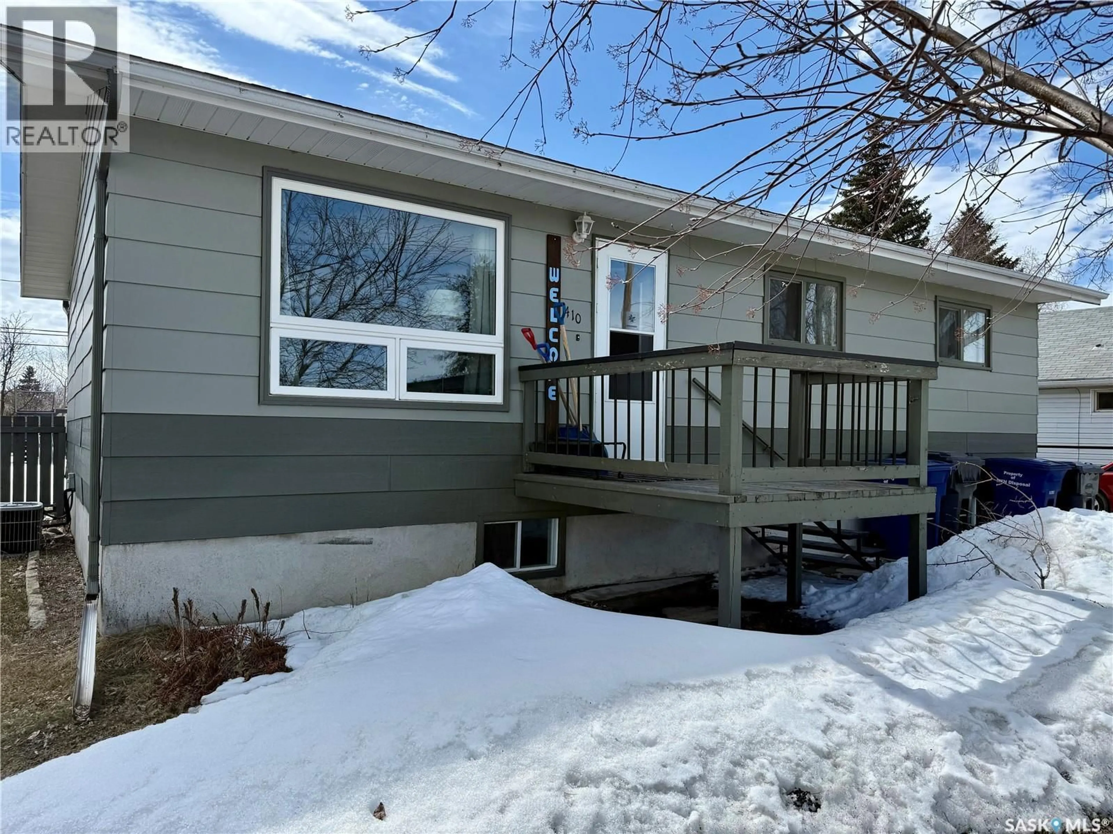 Home with vinyl exterior material, street for 410 MAPLE ROAD, Nipawin Saskatchewan S0E1E0