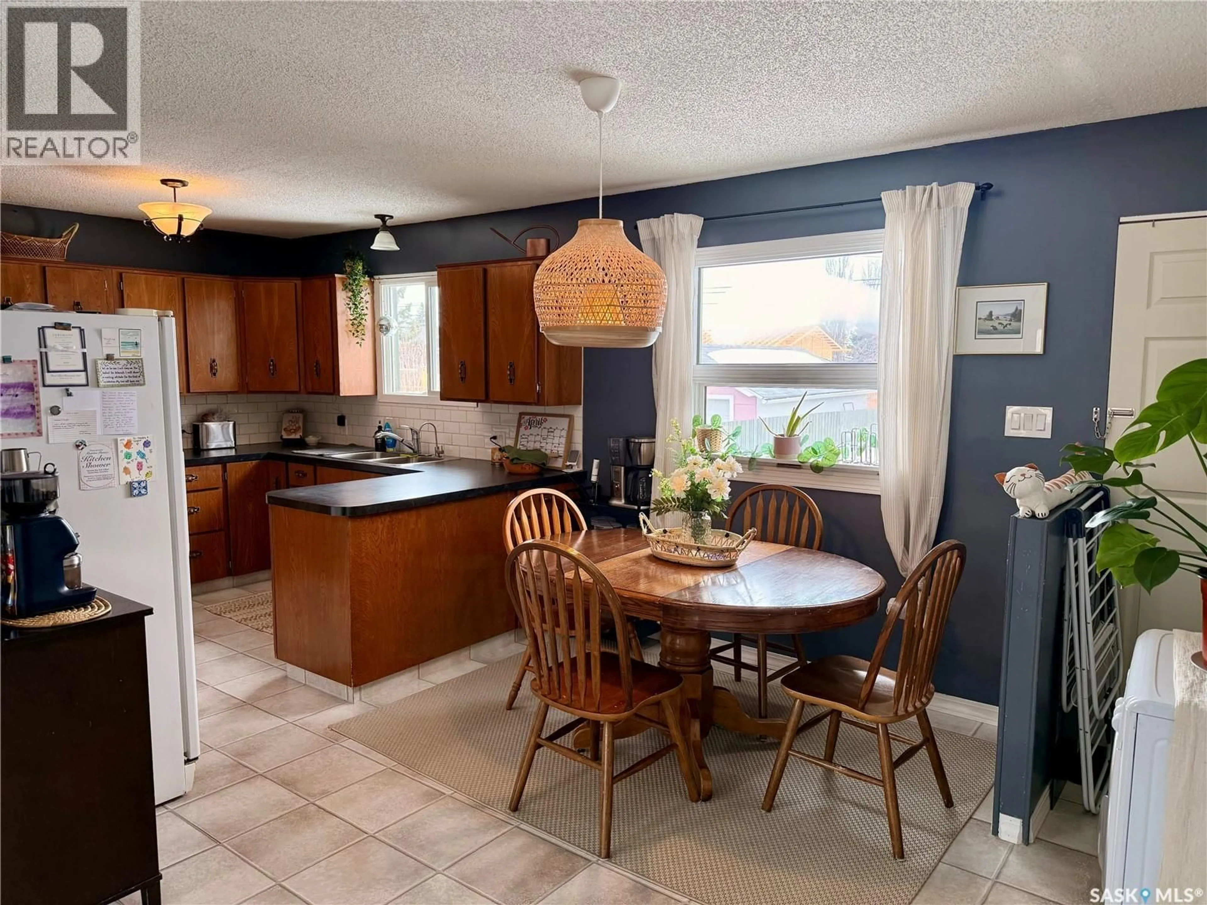 Open concept kitchen, unknown for 410 MAPLE ROAD, Nipawin Saskatchewan S0E1E0
