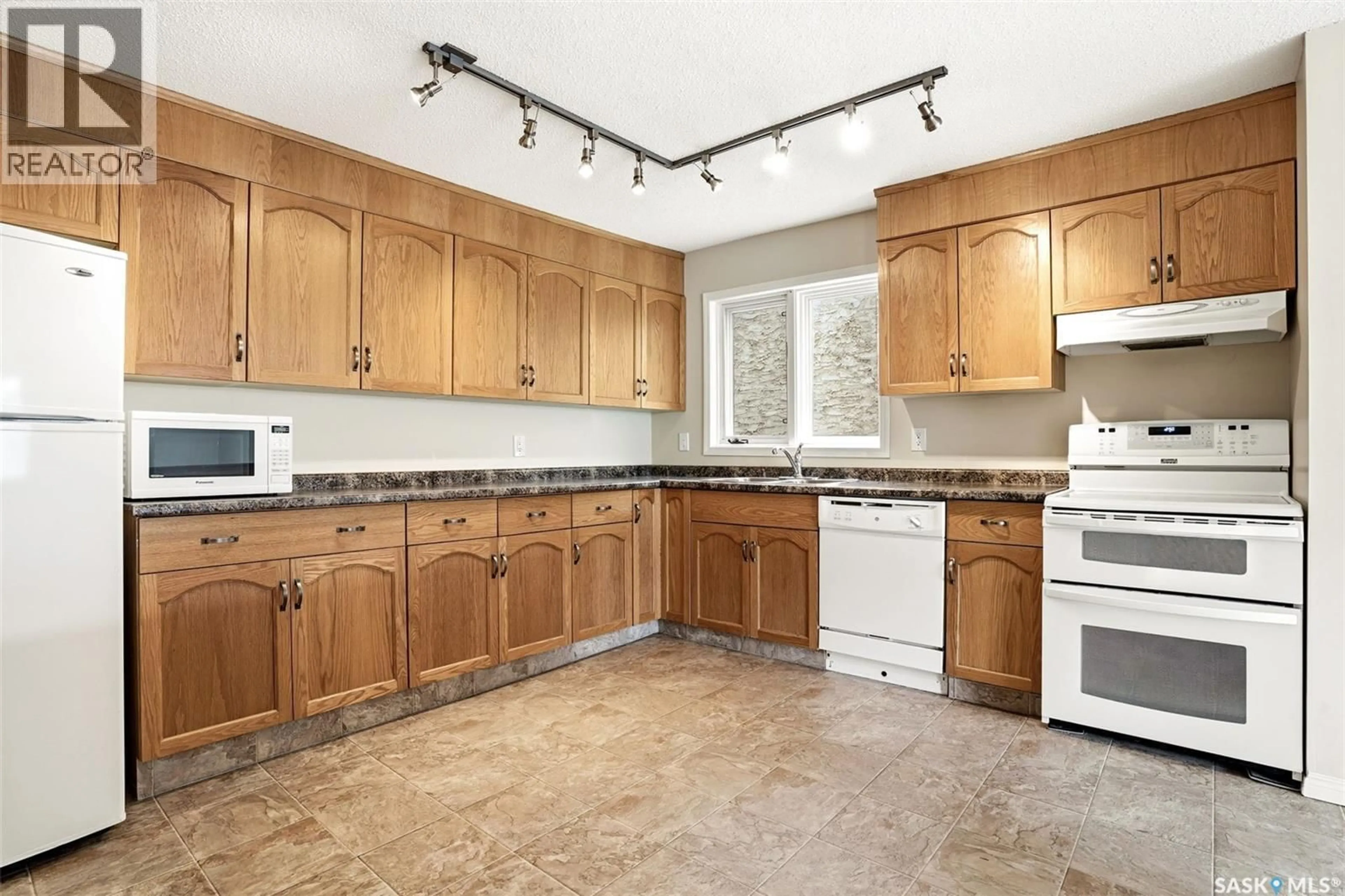 Standard kitchen, ceramic/tile floor for 2275 - 309 MCINTYRE STREET, Regina Saskatchewan S4P2S1