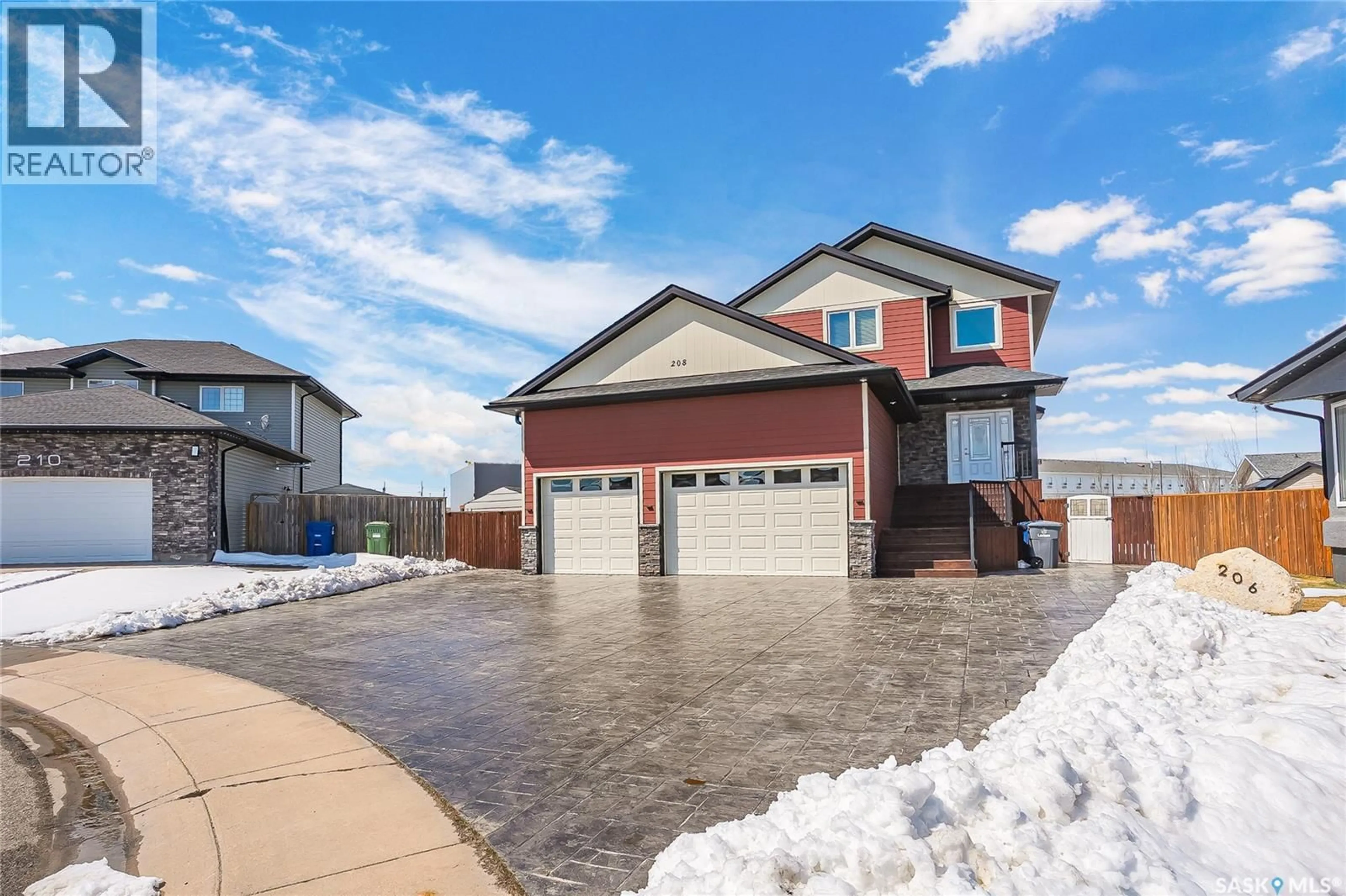 Home with brick exterior material, street for 208 O' MEARA COURT, Warman Saskatchewan S0K4S1