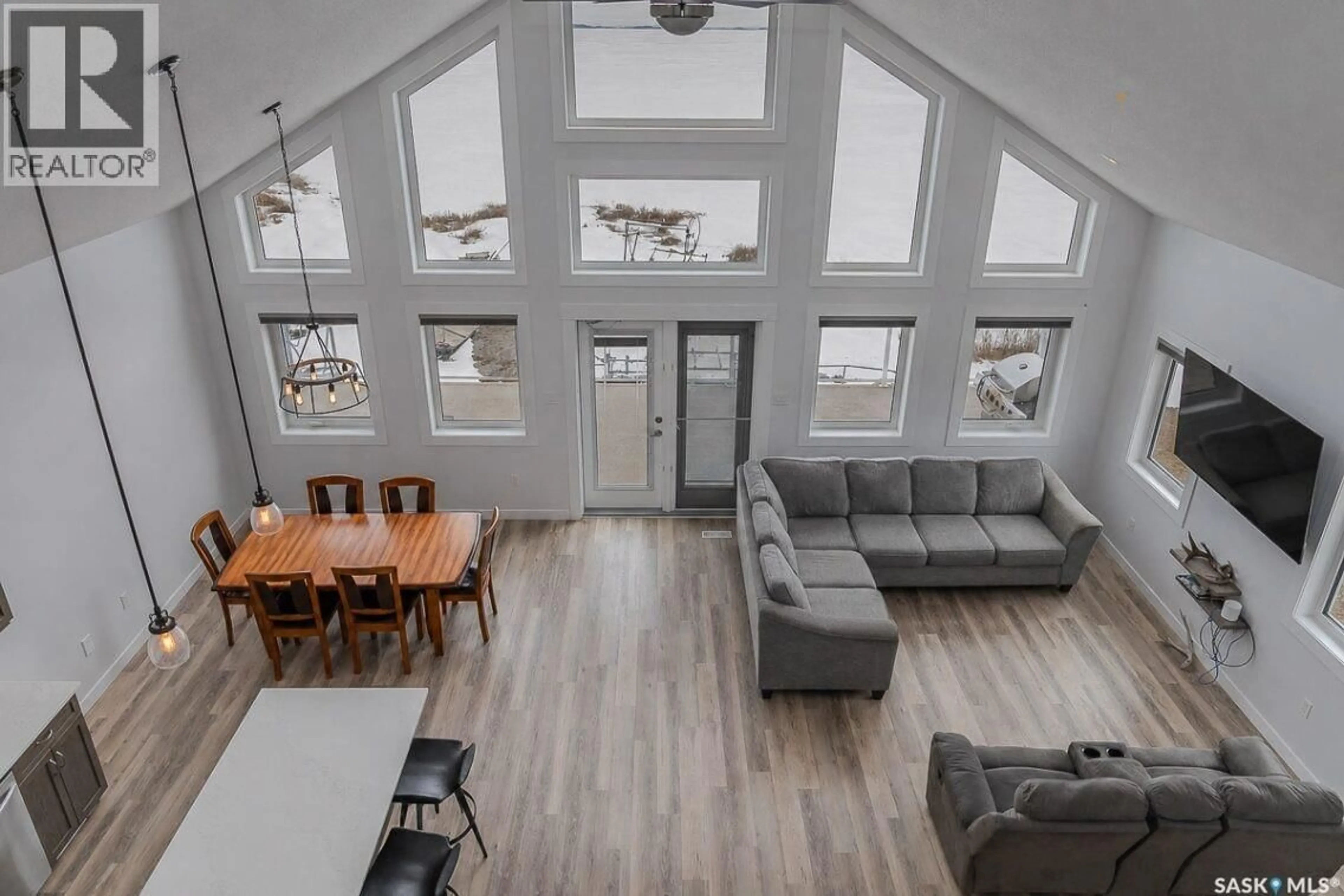 Living room with furniture, wood/laminate floor for 35 LAKE AVENUE, Meota Rm No.468 Saskatchewan S0M1X0