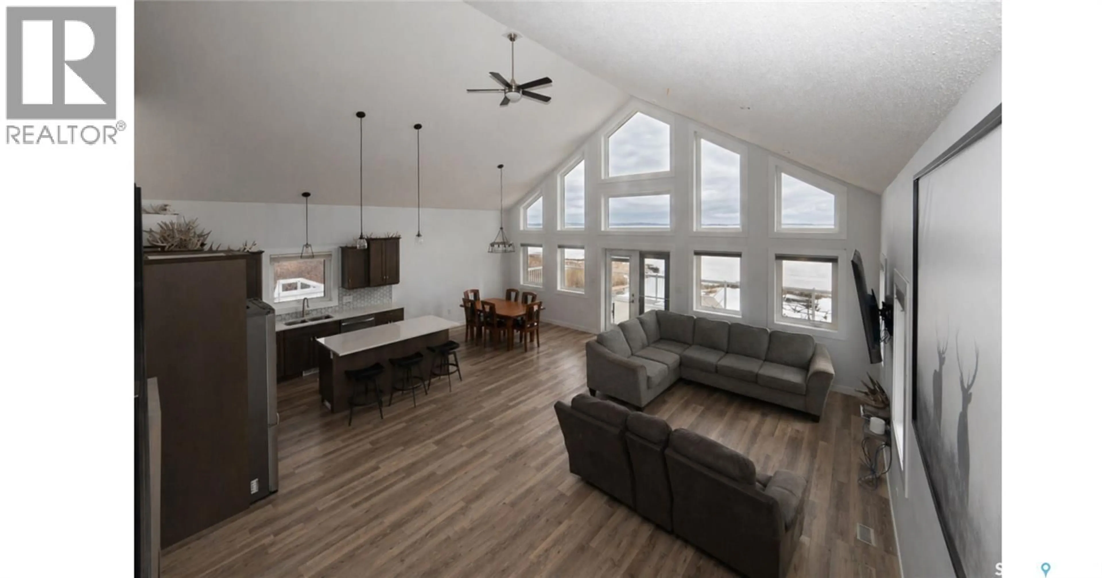 Living room with furniture, wood/laminate floor for 35 LAKE AVENUE, Meota Rm No.468 Saskatchewan S0M1X0