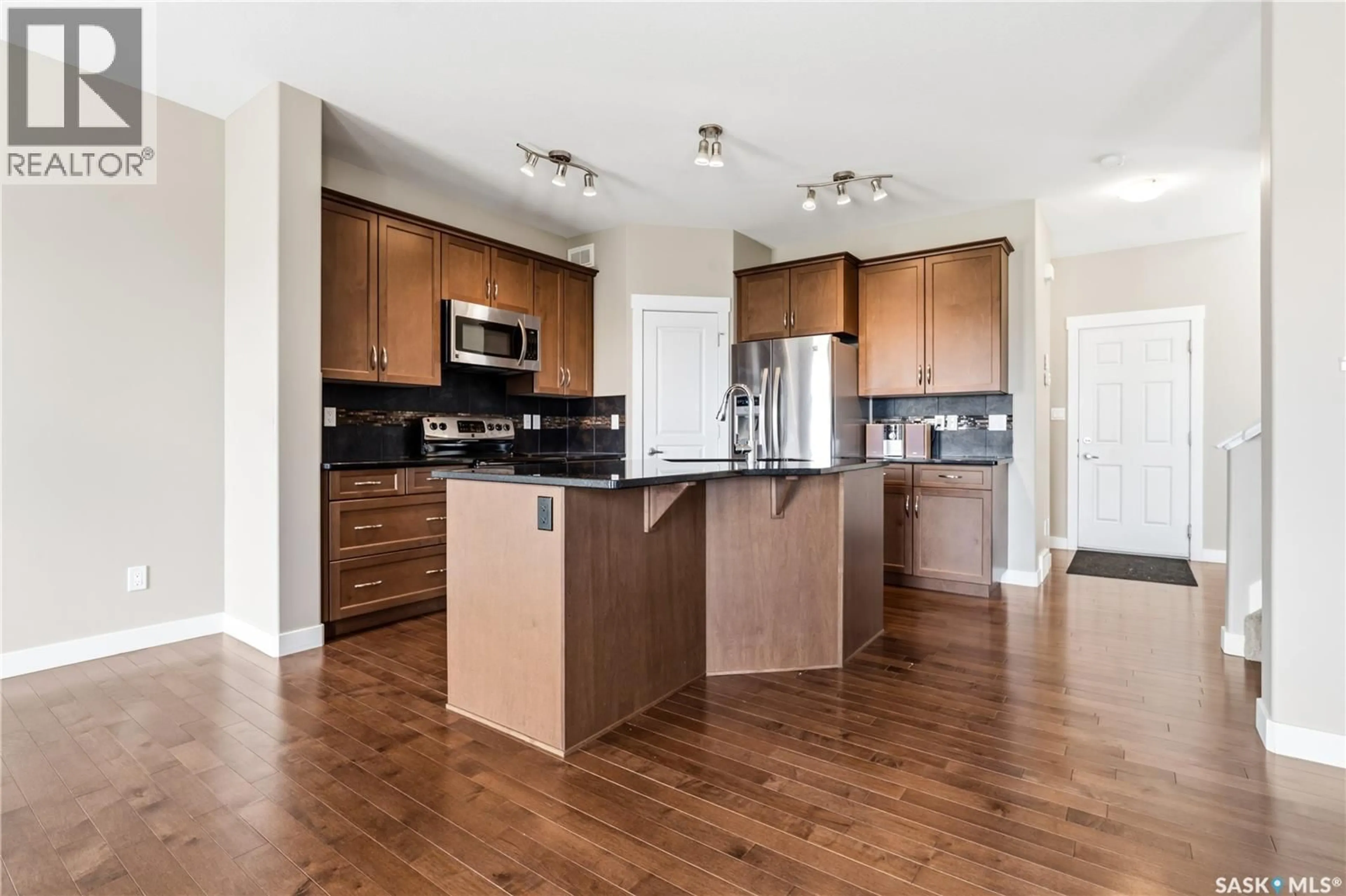 Open concept kitchen, unknown for 8814 HERMAN CRESCENT, Regina Saskatchewan S4Y0B7