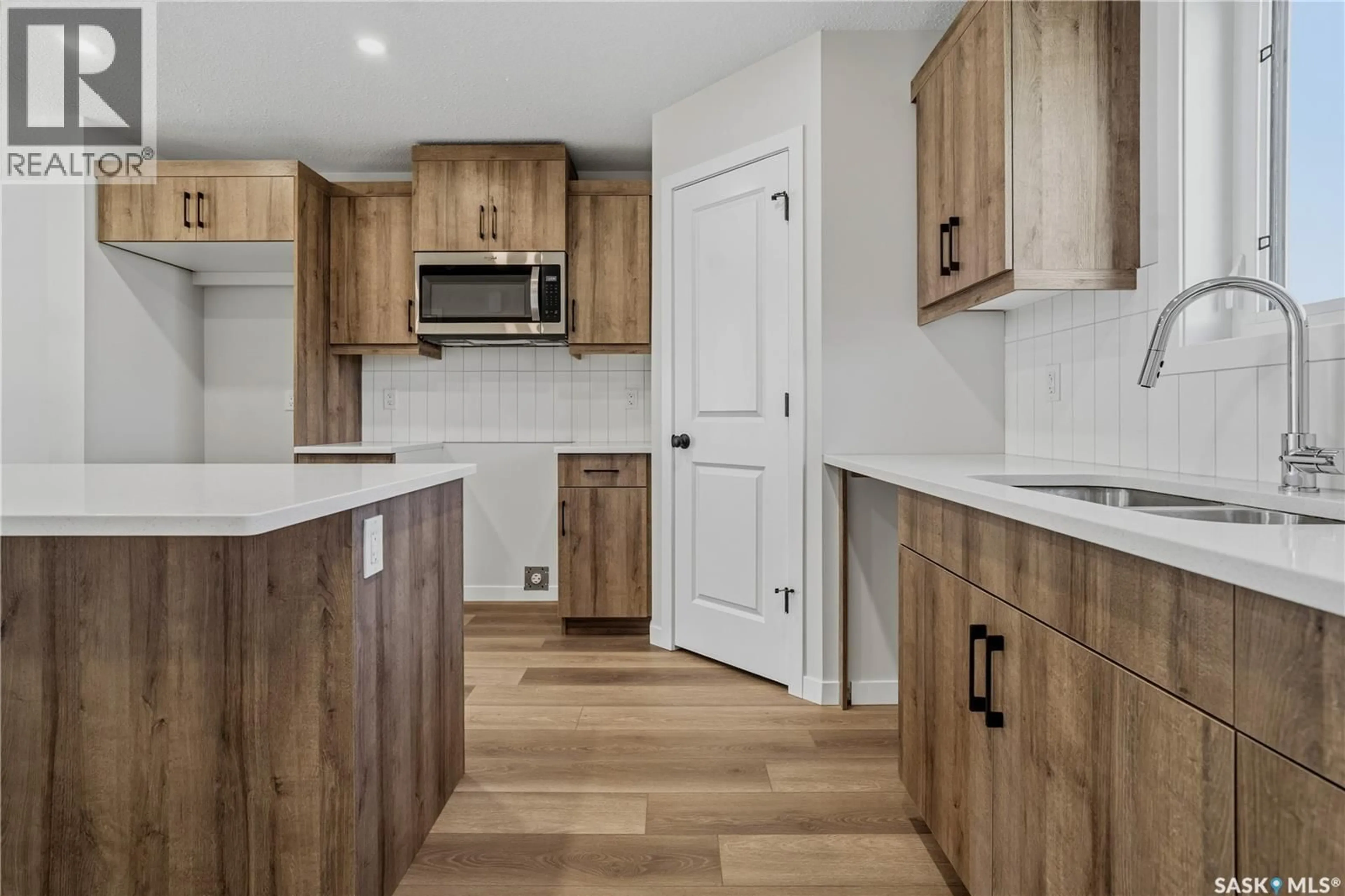 Open concept kitchen, unknown for 3156 GREEN TURTLE ROAD, Regina Saskatchewan S4V4C5