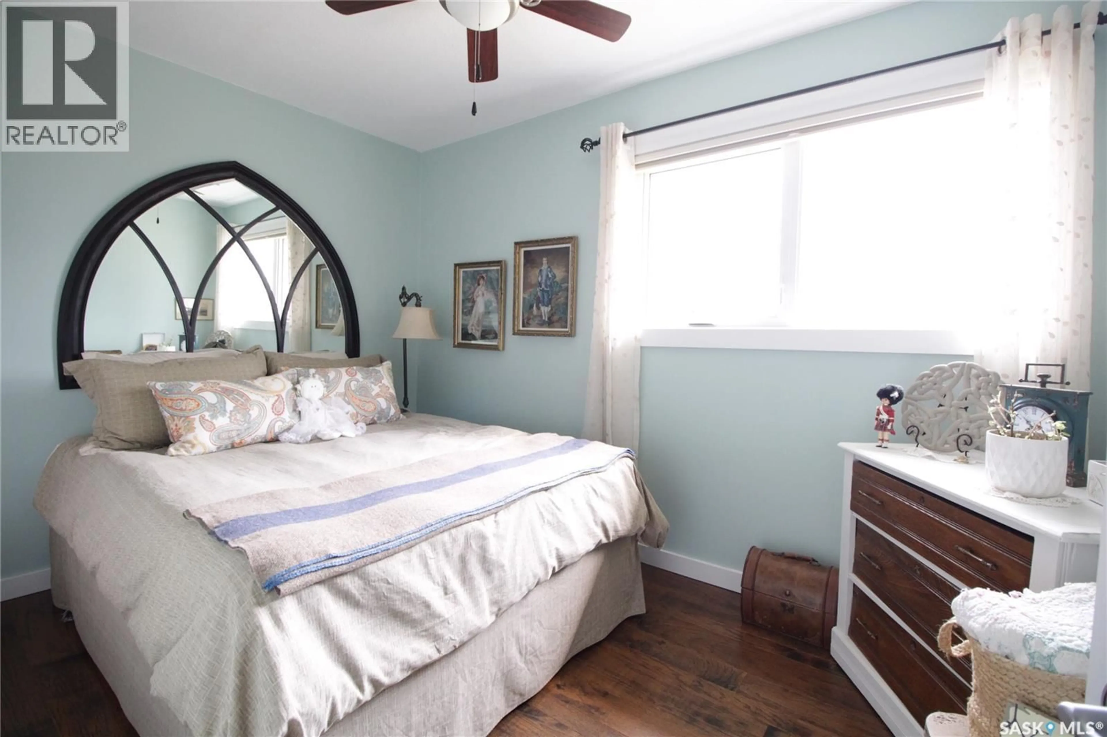Bedroom with bed, wood/laminate floor for 903 BALFOUR STREET, Whitewood Saskatchewan S0G5C0