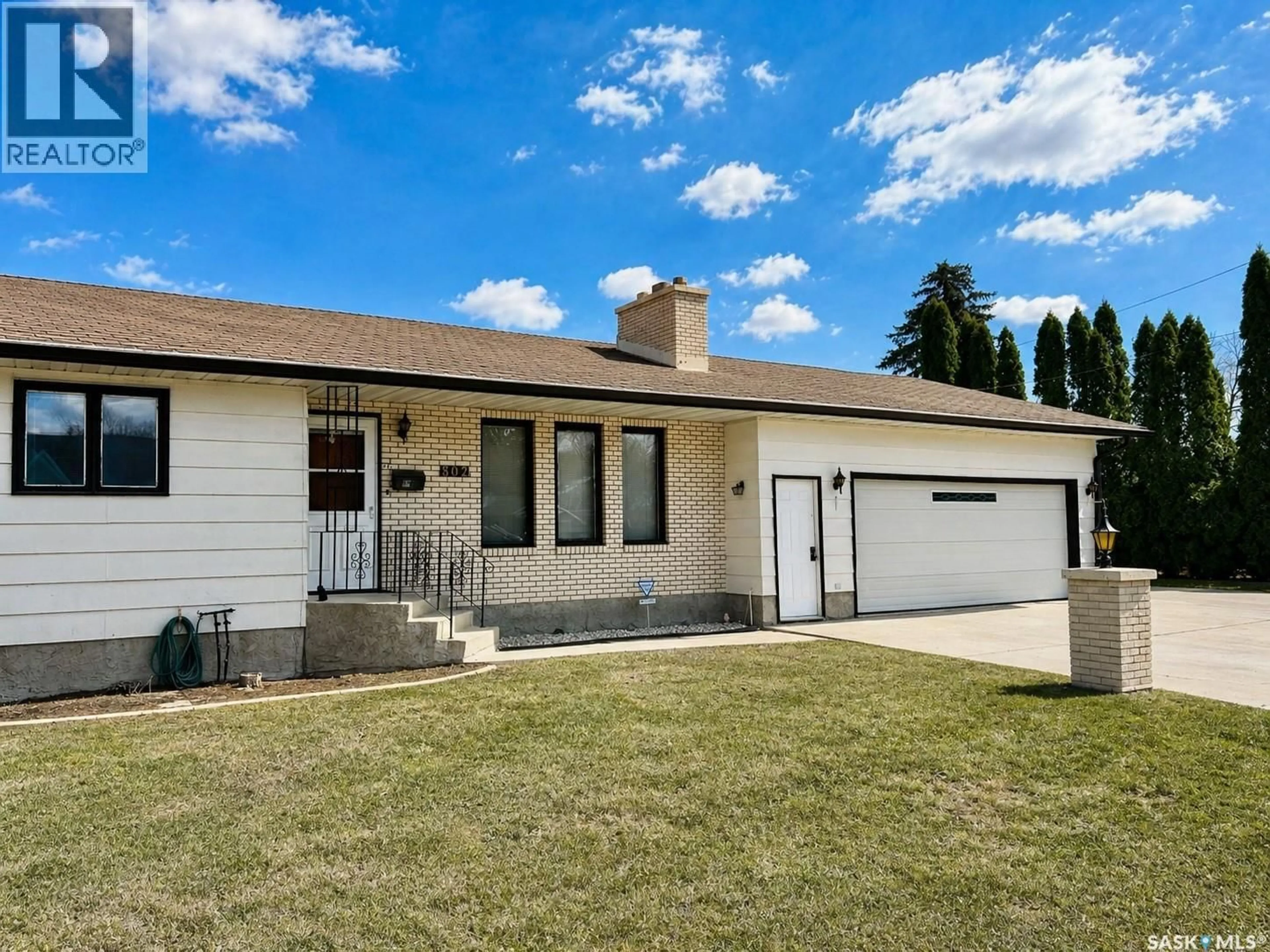 Home with vinyl exterior material, street for 802 7TH STREET, Saskatoon Saskatchewan S7H0Y4