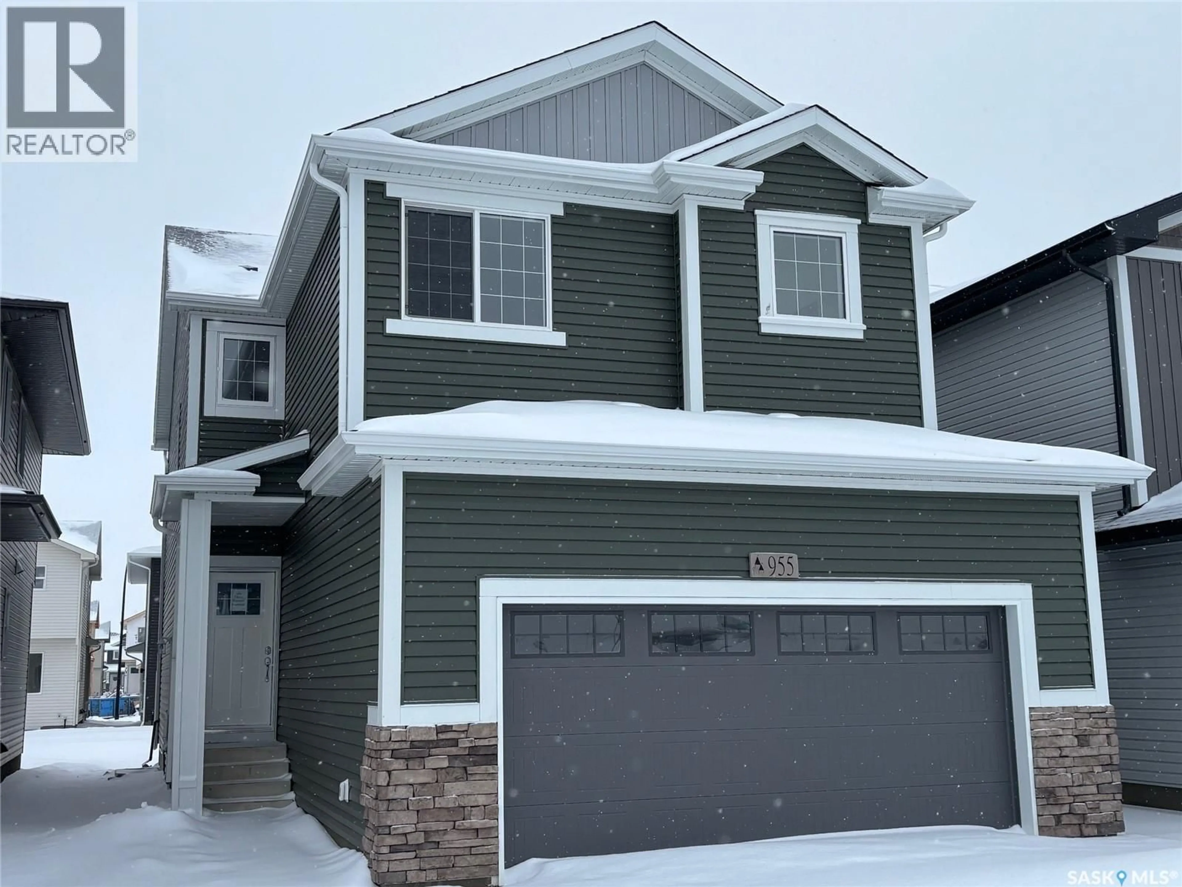 Home with vinyl exterior material, street for 309 COCKCROFT STREET, Saskatoon Saskatchewan S7V1Y9