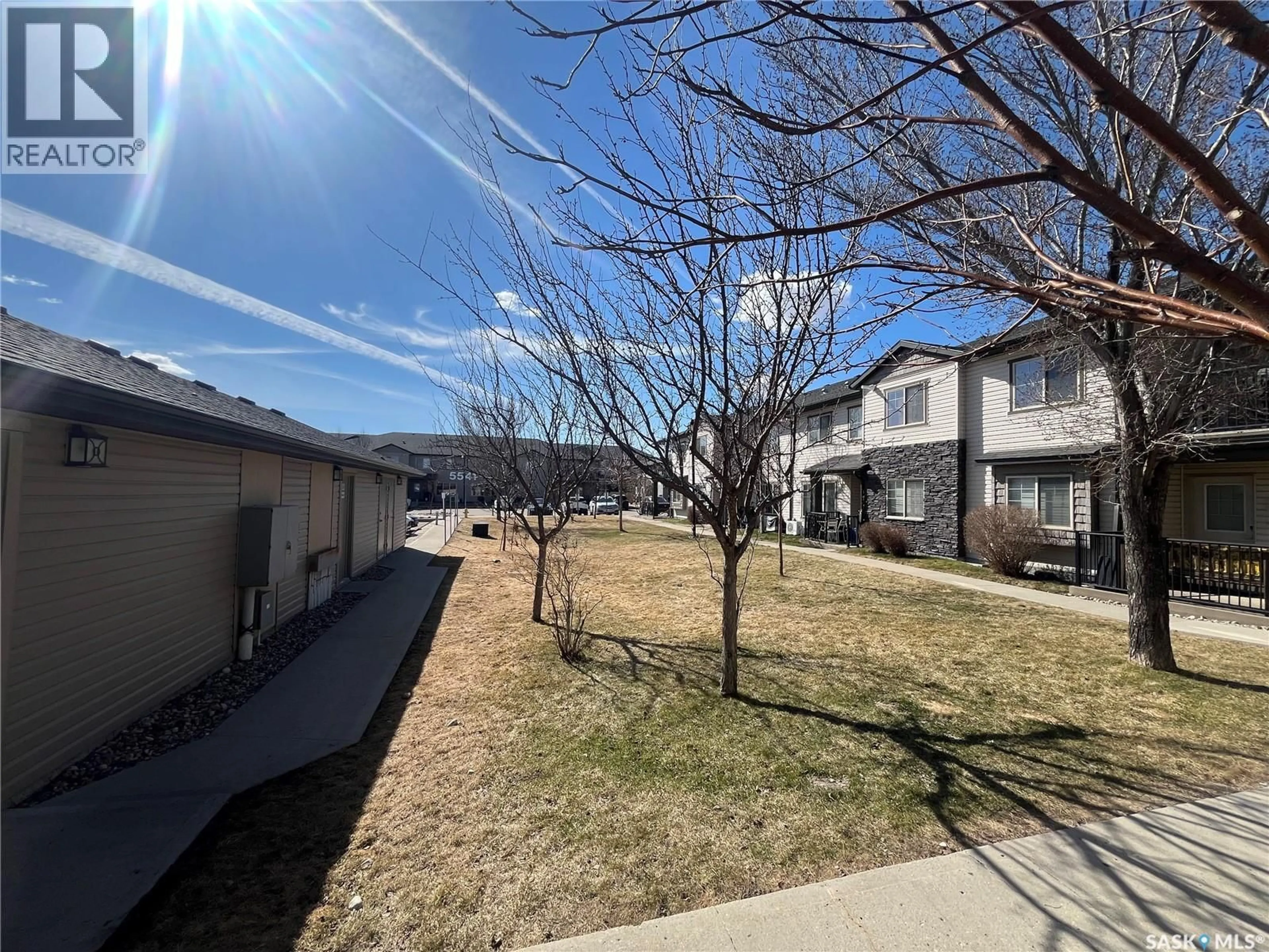 A pic from outside/outdoor area/front of a property/back of a property/a pic from drone, street for 51 - 5565 BLAKE CRESCENT, Regina Saskatchewan S4A0J1
